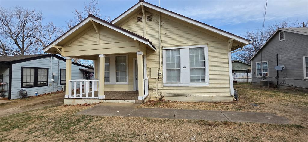 Cute three bedroom one bath home, metal roof, new carpet, updated windows. Aubrey ISD.