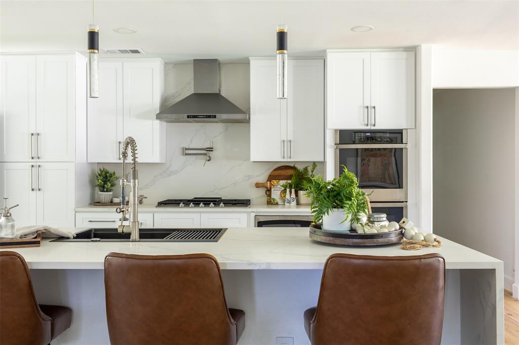 This stunning Glen Meadows home was taken entirely down to the studs in 2024. That means you get all the character of a premier Dallas neighborhood, but with the peace of mind of completely new modern plumbing—effectively erasing the ghost of cast-iron pipes past.

Located in the heart of Dallas' coveted Private School Corridor, this 4-bedroom, 4-bathroom property is engineered for effortless entertaining. The open-concept layout features a chef's kitchen anchored by a massive quartz island and custom cabinetry that flows into the main living spaces. In October 2025,  the sellers smartened up the layout by reconfiguring the space to create a true fourth bedroom, complete with its own private ensuite retreat.

The rest of the floor plan is just as intentional. You’ll find a dedicated home office, oversized secondary bedrooms, and a primary suite that feels like a high-end spa, boasting its own fireplace, an enormous walk-in closet, a soaking tub, and a dual rain shower.

Step outside, and the property delivers a rare slice of country charm right in the middle of the city. A mature, fruit-producing pear tree anchors the yard alongside a functional backyard chicken coop. Because the sellers are relocating out of state, the resident chickens are negotiable. They can stay behind to provide you with a built-in hobby farm and fresh breakfast every morning, or the sellers will happily relocate them before closing if poultry isn't your thing.

Extensively renovated, highly functional, and packed with personality, this move-in-ready home offers the absolute best of modern city comfort.