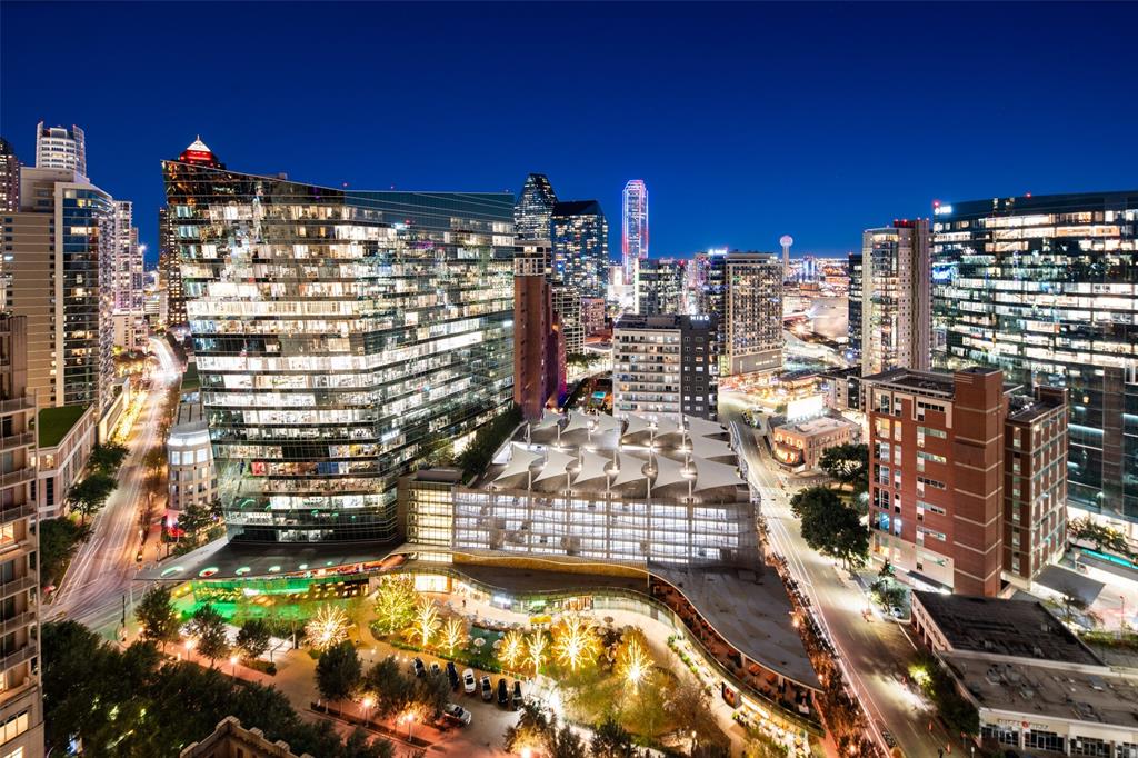 Elevating the concept of urban living, Residence 2101 at Ritz Carlton Tower 2 stands as a 'Mansion in the Sky' in Uptown Dallas. This luxurious sub penthouse offers more than just a residence; it presents an unparalleled lifestyle defined by extreme service, top-tier concierge amenities, & seamless connections to hotel services. The living space exudes opulence with higher ceilings and expansive windows providing panoramic views of the Dallas skyline. The 3 bedrooms, including a master suite with a spa-like bathroom, offer unparalleled comfort. Private terraces off each bedroom create intimate spaces for relaxation. Custom electric shades have been installed throughout the home. Gourmet kitchen, a culinary haven, features state-of-the-art appliances making it perfect for romantic dinners or entertaining guests. Enormous covered terrace transforms into an al fresco oasis. A dining area and a variety of plush seating configurations set the stage for intimate evenings high above the city.