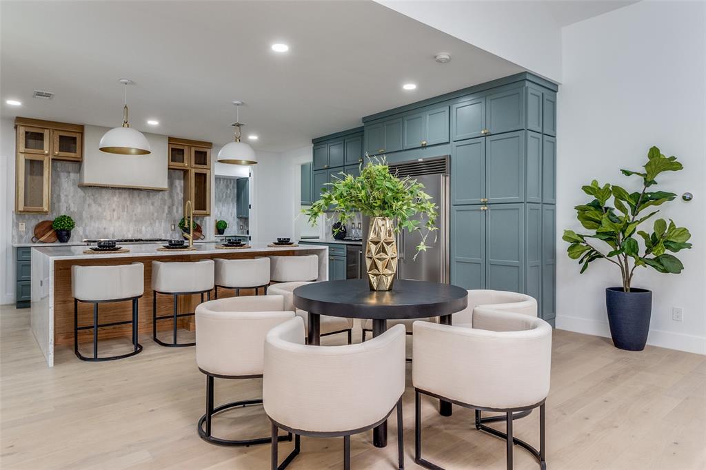Welcome to 7024 Lupton Dr, a beautifully remodeled residence nestled on the edge of one of the finest neighborhoods in Preston Hollow. This light-filled home features 5 spacious bedrooms, each with its own ensuite bath, along with a versatile bonus room that can serve as a studio, office, media room, or extra bedroom.The chef’s kitchen is a culinary delight, showcasing stunning marble countertops, an island, and Quartzsite surfaces, complemented by a butler’s kitchen that elevates your entertaining experience. Elegant decorative lighting, including three exquisite chandeliers, adds a touch of sophistication throughout the home. Enjoy cozy evenings by the fireplace in the great room or unwind in the inviting pool area, complete with a dedicated bath and built-in grill.Additional highlights include a workout room adjacent to the pool, a charming coffee nook featuring a wine cooler, and a spacious 3-car tandem garage. The property is secured with an electric gate and includes a dog run for added convenience. With Pella windows that promote abundant natural light and energy efficiency, this home seamlessly blends modern luxury with functional design. Experience exquisite living at its finest!
