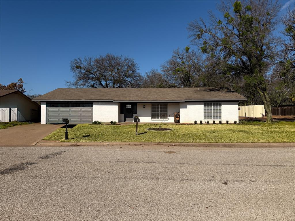 Located in an established neighborhood with a convenient, desirable location, this beautifully updated home offers both comfort and functionality. Inside, you’ll find three bedrooms and two bathrooms with a thoughtfully designed layout that features open-concept living and dining, perfect for everyday living and entertaining.

The new kitchen anchors the home with modern finishes and updates, complemented by a separate utility room and excellent storage throughout. Recent improvements include new vanities, updated lighting, ceiling fans, fresh interior paint, LVP flooring and tiles throughout, and enhanced landscaping, creating a move-in-ready experience.

The roof is less than six years old, providing peace of mind for years to come. Out back, enjoy a newly constructed screened-in porch (2024)—an ideal space for relaxing or hosting—with a dedicated outdoor TV outlet already in place. Alley access adds convenient entry to the rear of the home.

Well maintained and thoughtfully upgraded, this home blends modern updates with a practical layout in a great location—ready for its next owner to enjoy. Other updates include newer HVAC system (2021).