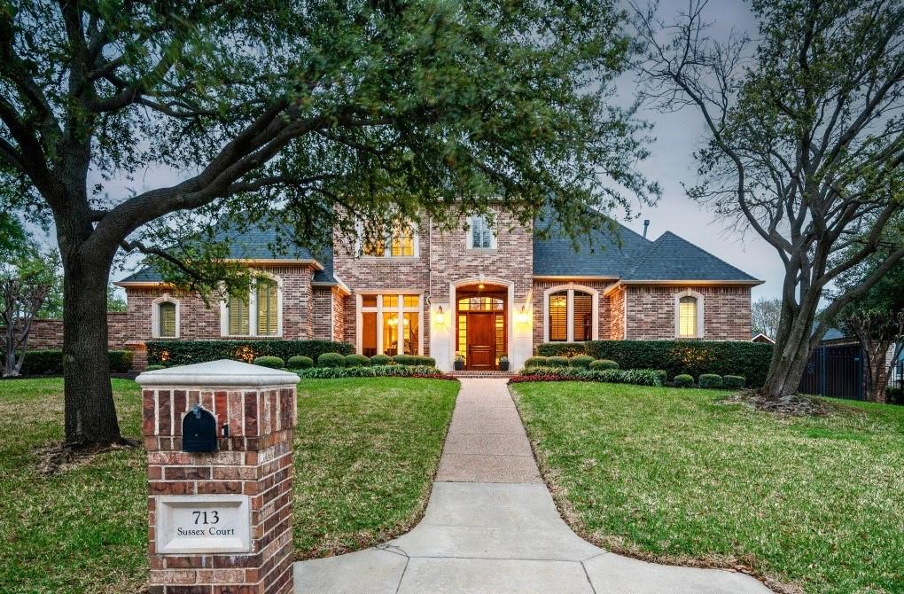 Gorgeous and immaculately maintained executive home in the highly sought-after neighborhood of Cambridge Place. Thoughtfully designed for the entertainer in mind, this one-of-a-kind custom home provides beautiful light-filled living spaces and one of the more impressive outdoor living experiences you’ll find. The stunning curb appeal will draw you in to find rich hardwoods, dramatic walls of windows, extensive millwork, and classic updates throughout. The bright and inviting kitchen is the heart of the home, opening seamlessly to the oversized family room with views of the lushly landscaped resort-like backyard. Step outside into the designated covered outdoor dining area that opens to an expansive outdoor living with vaulted ceiling, feature fireplace, built-in kitchen and bar, with plenty of space to host large gatherings in the comfort of a private backyard. Dive into the newly resurfaced sparkling pool with multiple water features, enjoy the large sodded area for play, or pull up a chair to roast marshmallows over the built-in fire-pit. The flexible 4 (optional 5) bedroom floor-plan offers primary suite and executive office down, with three spacious ensuite bedrooms and oversized great room with built in bar up. Who doesn’t love a secret room? Two bedrooms offer private access to an additional game room! Unwind in the comfort of your private primary suite with large updated bath with stand-alone tub, marble tile and graciously sized walk-in closet, or tackle a new hobby in the massive Laundry or impressive 4 car garage! Whether you love entertaining or are seeking a private estate to call home, nothing will compete with 713 Sussex, a luxurious retreat, right in the heart of Southlake; walking distance to Town Square, top rated Carroll schools and even Dragon Stadium! With easy access to highways and DFW airport but without the nuisance of road or air traffic noise, this home is perfect for the commuter looking for a peaceful place to unwind. Don't miss this one!