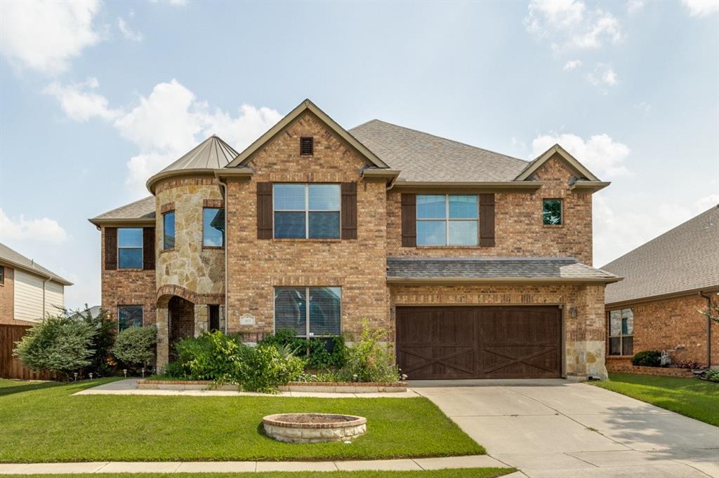 Step inside this spacious, open-concept floorplan and immediately feel at home. Stunning home with captivating curb appeal with turret entrance located in the Unique Dining Capital Of Texas...Roanoke! Featuring 4 bedrooms, 3.5 baths, an office, and a
formal dining room, this home offers plenty of space to meet all your needs. The living room boasts soaring ceilings,
stacked windows that flood the space with natural light, and a cozy corner fireplace. Open to the living room, the
kitchen is a chef’s dream with ample cabinetry, expansive counter space, a built-in desk, and a large island with
seating. The downstairs primary suite offers a private retreat with patio access, dual sinks, a jetted tub, and a separate
shower. Upstairs, a game room and a versatile media or flex room provide endless entertainment possibilities, while the
spacious secondary bedrooms and baths ensure comfort for all. The catwalk overlooking the living room adds to the
home’s airy, open feel. Step outside to the large covered patio, perfect for morning coffee or summer barbecues.
Located near Roanoke shopping, dining, and entertainment, the community also offers fantastic amenities, including a pool,
splash pad, parks, and miles of trails. This home truly has it all!