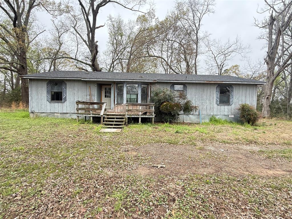 Handy Man Alert! This 3BR-2BA Home has had some renovations done. There's 1664 Sq Ft of living space, and you have1.09 Acres to make your own. There's enough space here for a small homestead. Located in Mount Pleasant, Texas - Titus County, with plenty of amenities nearby. Lake Bob Sandlin and Cypress Springs Lake are only minutes away. In 2022 a New Roof and New HVAC system was added. The kitchen is spacious, and has a large dining area attached, as well as a breakfast bar. The living room features a vaulted ceiling, and plenty of space for get togethers. The primary bath has double vanities-sinks and there's lots of closet space. BBQ on the back deck, and enjoy the views.