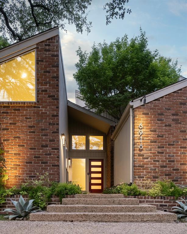 This isn't your typical Dallas home. Tucked into the heart of Windsor Place, just north of the Park Cities, this striking Transitional home stands apart with clean architectural lines, walls of glass, and a design that feels both timeless and effortlessly current.

Inside, nearly 3,000 square feet of thoughtfully designed living space offers 3 bedrooms, 3 full baths, soaring ceilings, and a practical, open floor plan that lives as beautifully as it looks. Natural light pours in throughout the day, creating bright, inviting spaces where you'll rarely need to flip on a light. Every room feels connected to the lush surroundings, bringing the outdoors in and creating a sense of calm that's hard to find in the city.

Adding even more versatility is a beautifully designed bonus loft—an architecturally integrated space that takes full advantage of otherwise unused volume. While not included in the home's 2,995 square feet, this bright and functional Bonus Room offers endless possibilities as a home office, creative studio, reading lounge, fitness space, play room or cozy escape, all while complementing the home's distinctive design.

Behind the modern aesthetic is a truly smart home. Control lighting, security, and multiple home systems directly from your phone, making everyday living as convenient as it is stylish.

One of this home's greatest luxuries is something you can't easily build—privacy. Thoughtfully positioned for exceptional visual privacy, the property offers a peaceful retreat with remarkably quiet surroundings, all while being minutes from Dallas' best dining, shopping, entertainment, and major business districts.

Beyond the home itself, Windsor Place is known for its welcoming neighbors and genuine sense of community.  So if you are someone who appreciates a peaceful neighborhood, architecture, technology, and a home with a personality all its own.