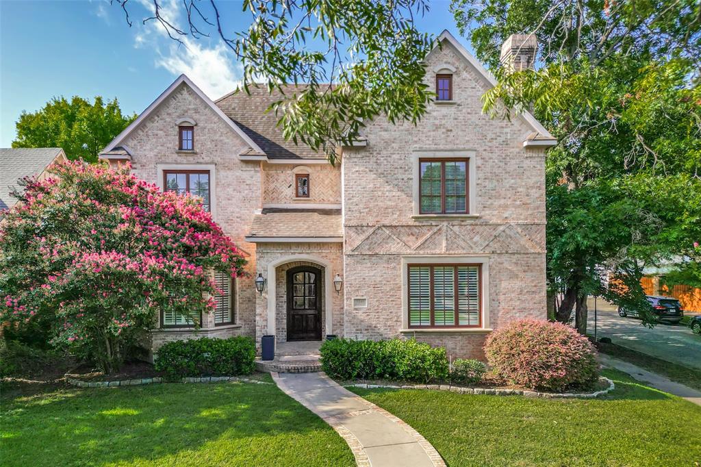 STUNNINGLY BEAUTIFUL HOME on CORNER LOT in HIGHLAND PARK SCHOOL DISTRICT has a GREAT LOCATION, just blocks from SMU and SNIDER PLAZA shopping.  PRIMARY BEDROOM SUITE DOWNSTAIRS!  Home features 4 Bedrooms,3.1 Baths, 3 Living Areas, HIGH SOARING CEILINGS, dramatic entry hall with winding staircase, spacious rooms and gleaming REAL WOOD HARDWOOD FLOORS throughout downstairs. Formal Living Room has WOOD BURNING FIRE PLACE and Soaring Ceilings.  DINING ROOM has bay window. DOWNSTAIRS OFFICE has PRIVATE ENTRANCE. GENEROUS BRIGHT WHITE KITCHEN has ISLAND, BREAKFAST BAR, SEPARATE BREAKFAST AREA, STAINLESS STEEL APPLIANCES, GRANITE COUNTER TOPS, BUTLER PANTRY and a SEPARATE PANTRY and a GAS STOVETOP. KITCHEN opens to LARGE FAMILY ROOM with WOOD BURNING FIREPLACE and WINDOW WALL.  Family Room overlooks LARGE COVERED PORCH and yard.  Upstairs has a LARGE THIRD LIVING AREA and a workout room. Close to SNIDER PLAZA, SMU, HIGHLAND PARK VILLAGE, BUSH LIBRARY, UNIVERSITY PARK POOL, NORTH PARK, PARKS.  All Information to be verified by Buyer.