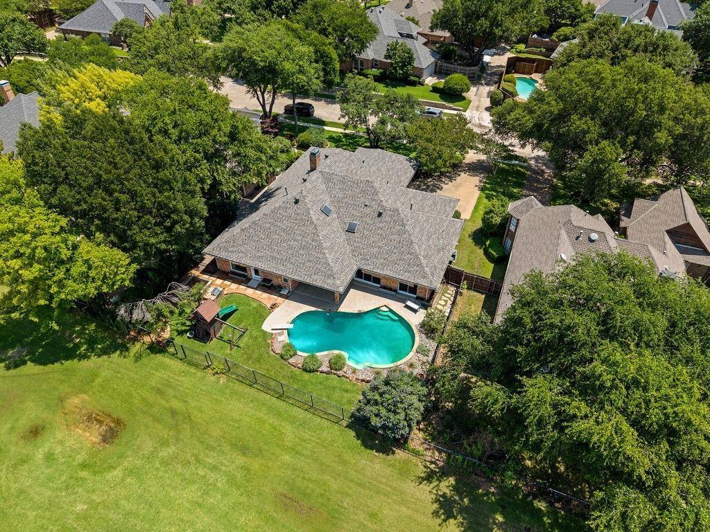 A RARE opportunity awaits to own the absolute best golf course views of Sherrill Park! Perfectly situated on a quiet, low-traffic street in the highly sought-after Springpark West neighborhood, this exceptional ranch-style home masterfully blends classic comfort with modern, thoughtful updates. Boasting an expansive and flexible floor plan, this residence features 5 bedrooms and 3 full bathrooms that have all been beautifully updated, with the 5th bedroom serving as a perfect bonus space for a private home office, media room, or flex area to fit your lifestyle.
Enjoy ultimate peace of mind with a host of recent capital improvements and high-tech upgrades, including a newer roof (2024), fresh interior paint, beautifully painted cabinetry, brand-new stainless steel double ovens, Nest thermostats, and a premium $2,000 security system. Step outside into your own private paradise, where elegant pavers guide you all the way from the north gate straight into the backyard. This true outdoor retreat frames spectacular, unobstructed views of the golf course alongside a pristine swimming pool, freshly resurfaced (2026) for years of worry-free enjoyment. To top it all off, this home offers an unbeatable, convenient location just minutes from major highways, premier shopping, and fantastic local restaurants, making it the perfect blend of luxury, lifestyle, and convenience.