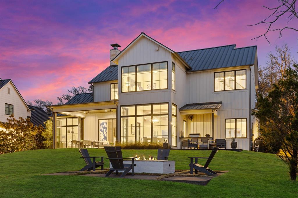 On the western shore of Long Cove, this spacious, modern farmhouse home is shaded by mature trees and enjoys panoramic lake views. There is no better place to enjoy a summer sunset than from the shoreline of Long Cove's most exclusive neighborhood -- West Point. This home offers the perfect balance of privacy, with easy access to Long Cove’s top amenities – pickleball courts, 2-acre putting green, tennis and basketball courts, Play Field, two resort style pools as well as the Proving Grounds 9-hole, par 3 golf course and 400-yard driving range.

This home was built by Platinum Series Homes (Mark Molthan) and is being offered fully furnished with two 6-seater golf carts.