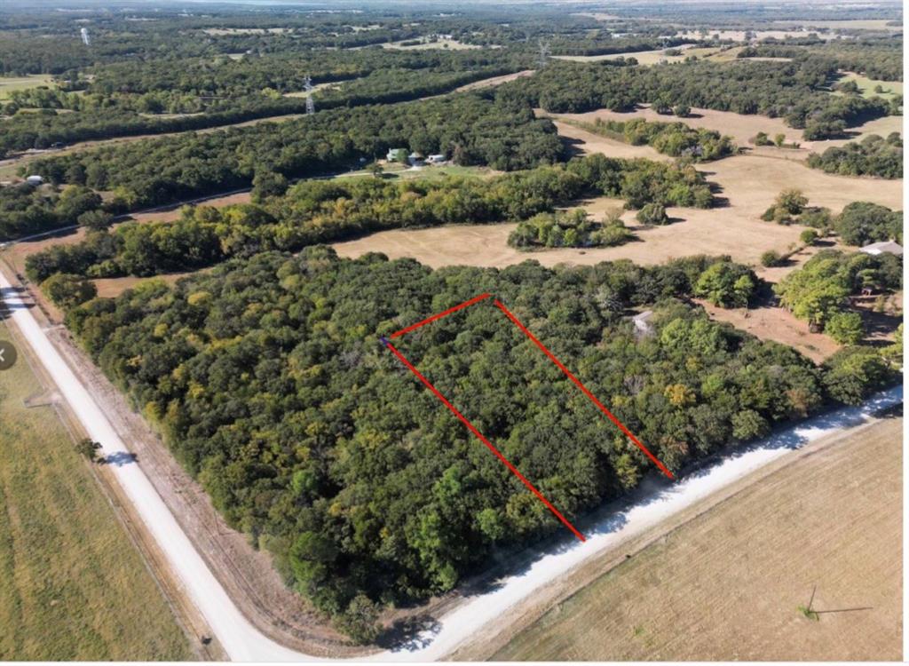 Lot 5 is WOW! Beautiful lot near Lake Kiowa and Mountain Springs is now available!! Gorgeous mature trees*Sandy loam soil* Valley View school district* Co-op water and electric available* 11 Miles to Lake Ray Roberts state park!! Great build sites on the lot. Bring your own builder and build  your dream home nestled in the oaks of Linken Landing.
