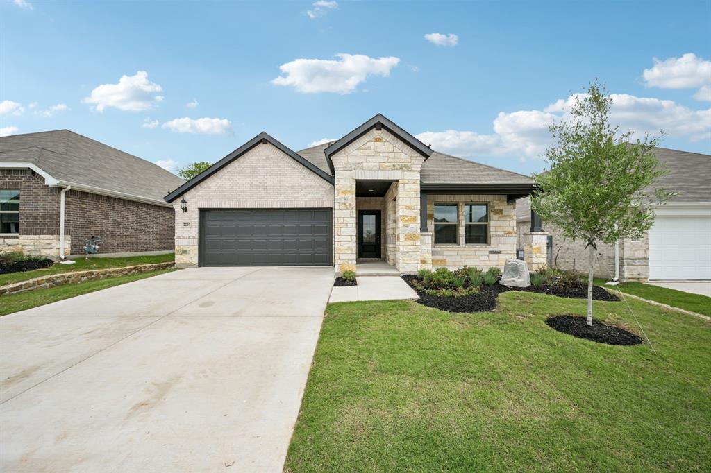 BRAND NEW energy - efficient home Mar 2026! Fix dinner at the Greenville's sprawling kitchen island without missing any of the action in the family room. White cabinets with veined white quartz countertops, muted beige EVP flooring with light taupe carpet. Small-town charm meets modern convenience in Sherman, located 40 miles north of the Dallas metroplex and recognized as one of the best small cities to live in. Westmoor residents will enjoy playgrounds, trail access, and a scenic greenbelt. Groundbreaking energy efficiency is also built seamlessly into every home in this community so you can spend less on utility bills and more on the things that matter most. Each of our homes is built with innovative, energy-efficient features designed to help you enjoy more savings, better health, real comfort and peace of mind.