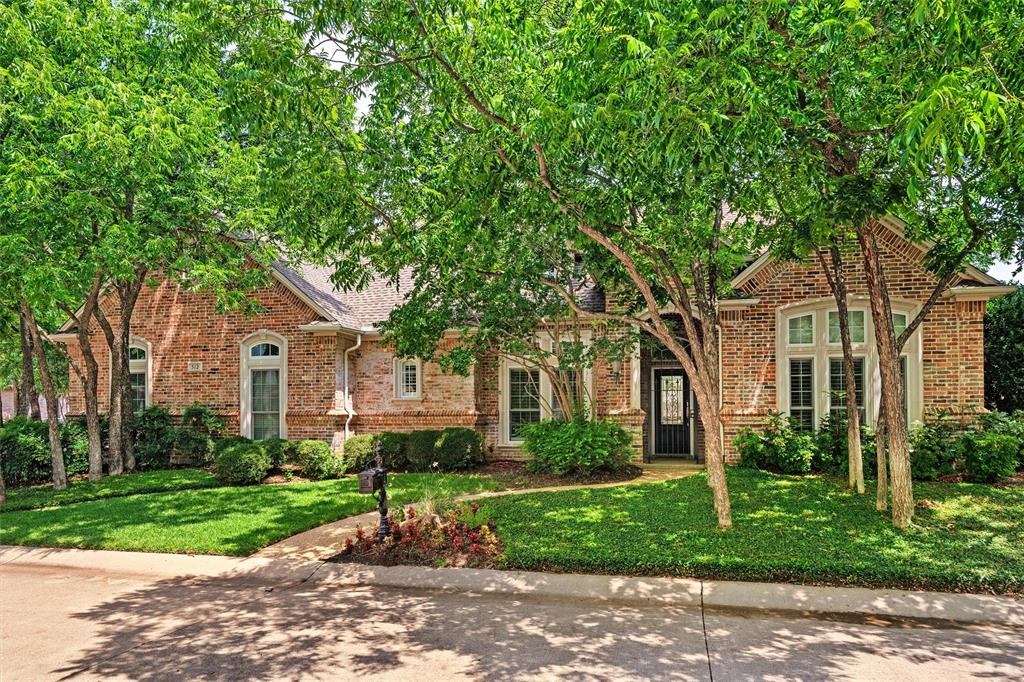 Welcome to Channing Park! This architecturally-refined residence is located on a premium lot in a private, gated enclave of exclusive homes in the heart of Arlington.  Refined elegance is reflected throughout with soaring ceilings, custom crown moulding and leaded glass ensconced transoms.
Most windows in this home have recently been replaced by Anderson.  The large and tall windows bring abundant, natural light into each room and allow stunning views to the manicured yards outside.  The kitchen is well appointed with quartz counters, stainless appliances and a pecan wood topped island! The primary bedroom also features views into the lush back yard and leads into the primary bath featuring a jetted tub, separate vanities and walk in closets. Two secondary bedrooms are located on the other side of the home.  A full-size washer and dryer fit easily into this utility room. It also comes with a sink, built in cabinets and a built in desk! The covered patio invites you to enjoy the spacious yard for your well-earned tranquility at day's end.  Thoughtfully designed for gracious entertaining or for rest and relaxation.  Buyer and buyer's agent to verify all data in MLS listing.
