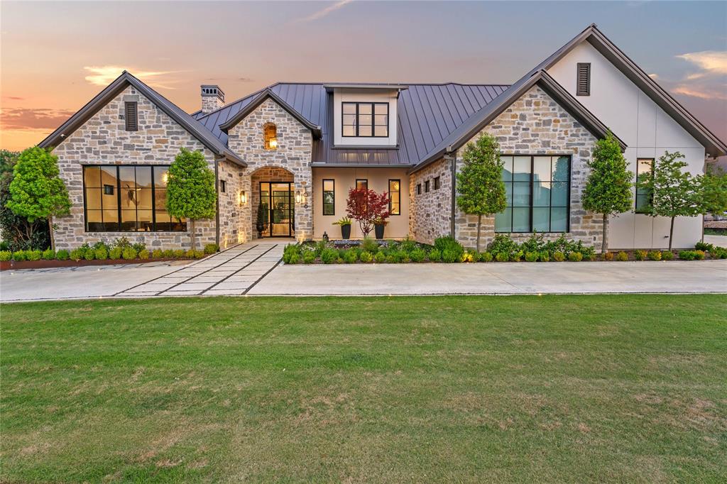 Luxury and cutting-edge design combine in this exquisite 4,400+ square-foot estate, masterfully built by Quarles Construction and set on 1.41 serene acres fronting Salado Creek. This 4-bedroom, 3.5-bath home blends high-end finishes with forward-thinking technology. Inside, you’ll find an open-concept living space anchored by custom steel windows that flood the home with natural light. The living room & primary suite both feature sleek DaVinci fireplaces, while a whole-house Aroma 360 scenting system & invisible in-room sound system offer a sensory-rich environment. A fully integrated smart home system allows seamless control of the temperature, lighting, audio, blinds, TVs, pool, & more all from your tablet or phone. The heart of the home is a chef’s dream kitchen with Wolf Sub-Zero appliances, luxurious quartzite countertops, soft-close cabinetry, and a butler’s pantry with an upright freezer, sink, vacuum seal drawer, and ample storage. Entertain with ease thanks to a dedicated wet bar featuring wine refrigeration and a 100% custom VintageView wine storage system. Retreat to the spa-like primary suite, where a full quartzite shower and automated Hunter Douglas shades create a perfect sanctuary. Additional spaces include a private office, game room, and bonus room. Outside, enjoy a fully outfitted outdoor kitchen, professional landscaping, a custom steel fence, integrated surround sound, and a path leading directly to Salado Creek. Sustainability and efficiency are top-of-mind with 60 owned solar panels, a whole-house Kohler generator with automatic switching, a 1,000-gallon underground propane tank, and two stainless steel rainwater capture tanks. The air-conditioned shop adds even more versatility. Furnishings are negotiable and are curated largely from Tommy Bahama, Arhaus, and Restoration Hardware, offering the perfect blend of relaxed luxury and timeless style. For a complete list of features, or to schedule a private tour, please contact listing agent.