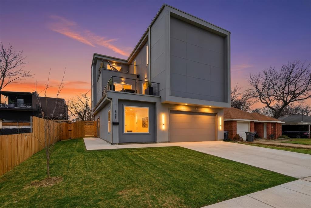 Welcome Home to 1810 Kraft Street! This one of a kind modern contemporary designed home with downtown views is nestled in Trinity Groves and just minutes away from American Airlines Center, Bishop Arts, the Design District, Uptown and Downtown Dallas! As you walk in the massive custom front door, you are greeted with a bottom floor living room along with 2 secondary bedrooms and a full bathroom. One of the bedrooms can double as a home gym or workout space. The second floor is the heart of the home which boasts a stunning kitchen with a 14-foot granite waterfall island, equipped with state-of-the-art appliances, this kitchen is a chef's dream - plenty of pantry and storage space as well as a massive kitchen island. The kitchen seamlessly connects to a bright living room with 18-foot ceilings and numerous windows, flooding the space with natural light, luxury lighting and a 70 inch fireplace. A charming balcony extends off the living room, and provides access to the 2nd floor guest bedroom along with a full bathroom and super easy access to the laundry room. The primary suite is on the 3rd level - It includes a cozy seating area for relaxation which could also be used as an office space and opens to the balcony where you can enjoy even more great views of downtown! The luxurious ensuite bathroom has dual vanities, a modern free standing soaking tub, and a 2 sided shower offering a spa-like feel. This home is thoughtfully designed to accommodate a rooftop deck, providing an incredible opportunity for outdoor living and entertaining! A full water filtration system also is installed on the home, security system and alarm, new modern front door installed. This property is perfect for someone looking to live close to Downtown and Uptown with an easy commute to work or an investor looking to turn this gorgeous property into a cash flowing Air BNB Investment. Come make an offer before someone else does!