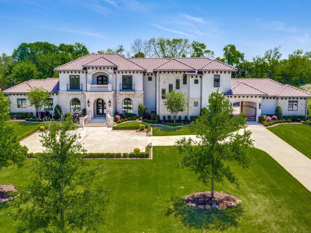 Entertainers dream estate situated on an enchanting 2.1 acre treed cul-de-sac lot. This estate is a perfect blend of elegance and functionality with its stunning luxury rustic design. Quality craftsmanship with extensive beautiful wood floors. Stunning 2 story foyer that leads to handsome study, sweeping wrought iron staircase, formal dining, and sitting area. The gourmet kitchen features quartz countertops, Thermador refrigerator, Wolf appliances, 2 dishwashers, wet bar with Sub Zero, and large island with built-in table. Chef's kitchen opens to the grand family room with wood beams and a wall of windows. Private master suite features amazing pool view, a patio, his & hers vanities, soaking tub, walk-in double headed shower, and large closet.  Private resort style back yard complete with expansive pool, in-pool table with bar stools, fire bowls, water features and spa. Outdoor living area with kitchen and fireplace. Lighted tennis court. Minutes to dining and shopping. LOVEJOY ISD.