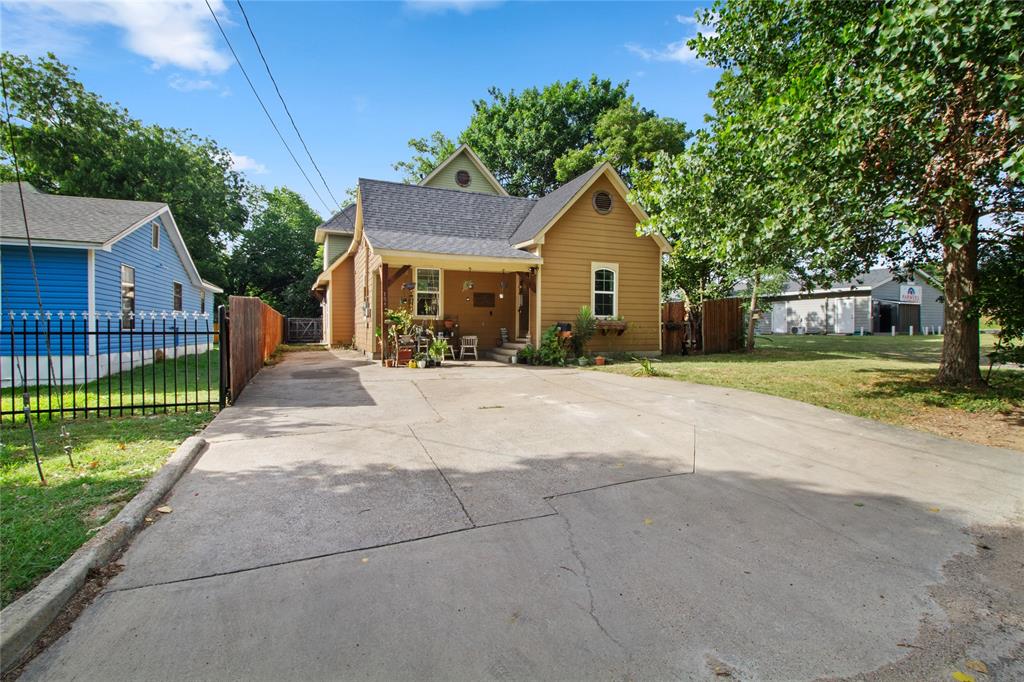 Sellers preferred lender is offering a 2,1 rate buy down and offers a no refinancing fee for life! Welcome to this spacious, character-filled home just minutes from the heart of historic downtown Ennis. Offering over 3,000 square feet of living space, this one-of-a-kind property blends timeless charm with everyday functionality. From the inviting covered front porch to the soaring decorative ceilings and expansive living areas, you’ll immediately appreciate the warmth and character this home has to offer. The kitchen is perfect for both everyday living and entertaining, featuring granite countertops, stainless steel appliances, a gas range, and custom cabinetry. The spacious dining and living areas provide the ideal setting for family gatherings, holidays, and entertaining guests. The flexible floor plan includes four generously sized bedrooms and three full bathrooms. What truly sets this home apart are the two oversized bonus rooms, offering exceptional versatility that is hard to find at this price point. Whether you envision a home theater, game room, playroom, homeschool space, gym, craft room, executive office, guest retreat, or additional sleeping quarters, these spaces can easily adapt to your family’s changing needs for years to come. A full bathroom conveniently located just off the laundry room adds even more flexibility, making this section of the home ideal for guests, multigenerational living, or a private workspace.

Step outside to enjoy the fully fenced backyard shaded by mature trees, complete with a detached workshop or storage building, gated access, and plenty of room for hobbies, gardening, pets, or weekend gatherings.

This home offers an incredible combination of space, character, flexibility, and value. If you’ve been searching for a home that provides room to grow without sacrificing charm, 105 E. Linden Street is one you won’t want to miss.