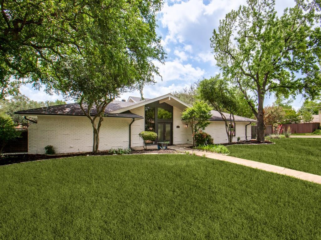 Unbeatable location! This Distinctive midcentury modern ranch delivers standout architecture, incredible curb appeal, and an entertainer’s dream layout on a stunning oversized interior corner lot. Major system upgrades already completed including roof, BOTH HVAC systems, electrical, and plumbing. No cast iron plumbing — ALL new PVC plumbing installed in 2026 beneath the home and extended to the street. Thoughtfully designed with 2 split-level great rooms, the open-concept floorplan offers exceptional flexibility for everyday living, relaxing, or hosting guests. Engineered hardwoods, new plush carpet, 4000K LED lighting, fresh neutral interior+exterior paint selections, kitchen with stainless steel appliances, granite countertops, oversized island, and shaker-style cabinetry. The private primary retreat features an oversized walk-in shower and large walk-in closet for a true spa-like feel.  Enjoy the peaceful outdoor setting with a private balcony, flagstone patio, courtyard, and board-on-board fencing. 4th bedroom could easily double as private office if desired. Oversized rear-entry garage with epoxy floor offers bonus parking+storage & has updated garage doors, motors, and openers. Ultra convenient location near DNT, 635, 75. ENJOY being in close proximity to multiple country clubs, top private schools, dining+nightlife, parks, and trail systems. Pride of ownership is evident here. Opportunities to own a home like this are rare—don’t miss your chance to make it yours!