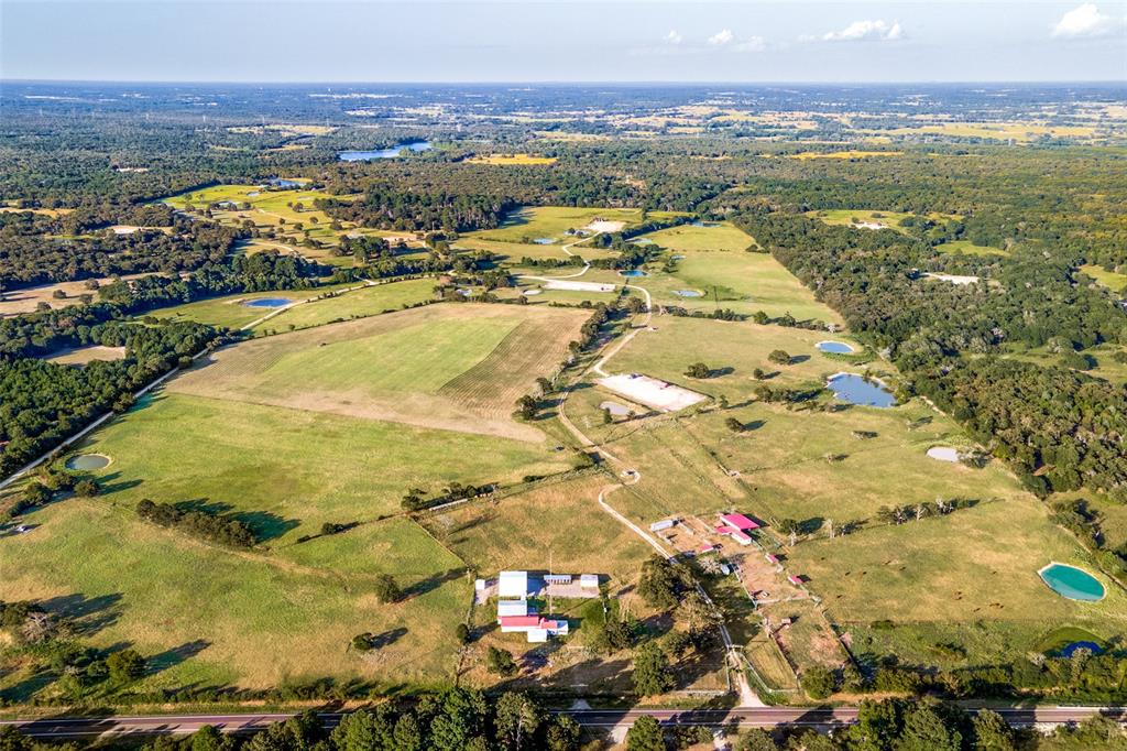 476 acres of prime cattle country.   90% open with improved pastures and plenty of water for a turn key cattle operation.   The highlights include well-watered and cross-fenced pastures with good working pens, 40-acre hay meadow, incredible wildlife opportunities, and FM 39 road frontage.  19 ponds, 1 lake, and 2 water wells.  Several beautiful home site possibilities.  Located 100 miles from Dallas and 150 miles from Houston.