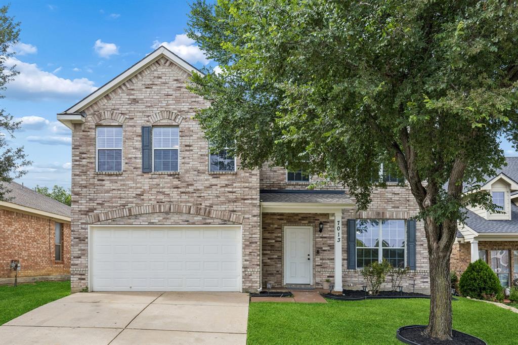 Discover exceptional space, modern updates, and a highly convenient location at 7013 Lindentree Lane, a beautifully refreshed brick home tucked away on a private cul-de-sac in an established neighborhood. Built in 2003 and offering approximately 2,208 square feet, this thoughtfully designed residence features 3 bedrooms, 2.5 bathrooms, multiple living spaces, and a flexible layout ideal for today’s evolving lifestyle needs. Recent improvements create a move-in ready experience, including recently completed interior painting, new carpet, remodeled bathrooms, updated kitchen cabinets, and a full suite of new kitchen appliances that add style and functionality to the heart of the home. The spacious kitchen opens naturally to the main living area, creating an inviting flow for everyday living, entertaining, remote work flexibility, or relaxing evenings at home. Upstairs, the oversized game room or second living area provides valuable bonus space that can easily adapt to a media room, office, fitness area, or hobby space. The primary suite offers generous proportions along with an updated bathroom designed with refreshed finishes and comfort in mind. Secondary bedrooms provide versatility for guests, workspace, or additional living needs. Outside, the large backyard and covered patio create an ideal setting for outdoor dining, gatherings, gardening, or enjoying quiet evenings with added privacy from the cul-de-sac location. Attractive curb appeal, mature surroundings, and excellent access to shopping, dining, schools, parks, and major commuting routes further enhance the value of this property. Combining updated interiors, flexible living spaces, and a desirable location, this North Texas home delivers the features buyers frequently search for, including updated kitchen, remodeled baths, game room, covered patio, large backyard, and move-in ready condition.