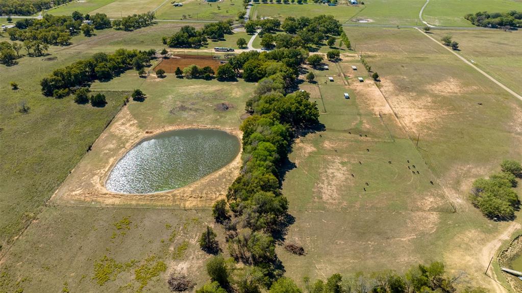 Tucked away just an hour outside of Fort Worth & Dallas, Texas, in Maypearl is the Morrow Ranch. This ranch is truly an oasis, with a custom-built home, expansive backyard, and top-tier equestrian facilities. Morrow Ranch offers privacy and seclusion, while simultaneously offering convenience to the metroplex of DFW. Whether you're looking to move away from the ever-growing city, or interested in a weekend escape, the Morrow Ranch
is a must-see property. Location: Located in the town of Maypearl in Ellis County, Morrow Ranch is just 40 miles from Fort Worth & Dallas and
less than a 15-minute drive away from the town of Waxahachie.