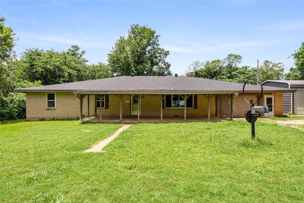 Spacious single story home on 3.32 acres in Alvarado with room to spread out, work, entertain, and enjoy a peaceful country setting. This property offers over 3,300 square feet of living space with 5 bedrooms, 2 full bathrooms, one half bathroom, multiple living areas, and a flexible layout that provides plenty of room for everyday living.

Inside, the home features an updated kitchen with a large center island, painted cabinetry, stone look countertops, tile backsplash, and open flow into the main living and dining areas. Several areas of the home include updated wood look flooring, while other spaces offer an opportunity for a buyer to add their own finishing touches. The oversized living areas, spacious bedrooms, and multiple flex spaces make the home easy to adapt for a variety of needs.

Outside, the property offers a wide gravel drive, mature trees, open yard space, an attached garage, covered parking, a detached metal workshop with roll up doors, and an above ground pool that will convey with the sale. The acreage provides a great mix of usable open space and a wooded backdrop, creating a private setting with plenty of room for outdoor use, storage, hobbies, equipment, or future improvements.

Located in Alvarado with convenient access to nearby highways, shopping, schools, and surrounding communities, this property is a great opportunity for buyers looking for space, square footage, acreage, and room to make it their own.