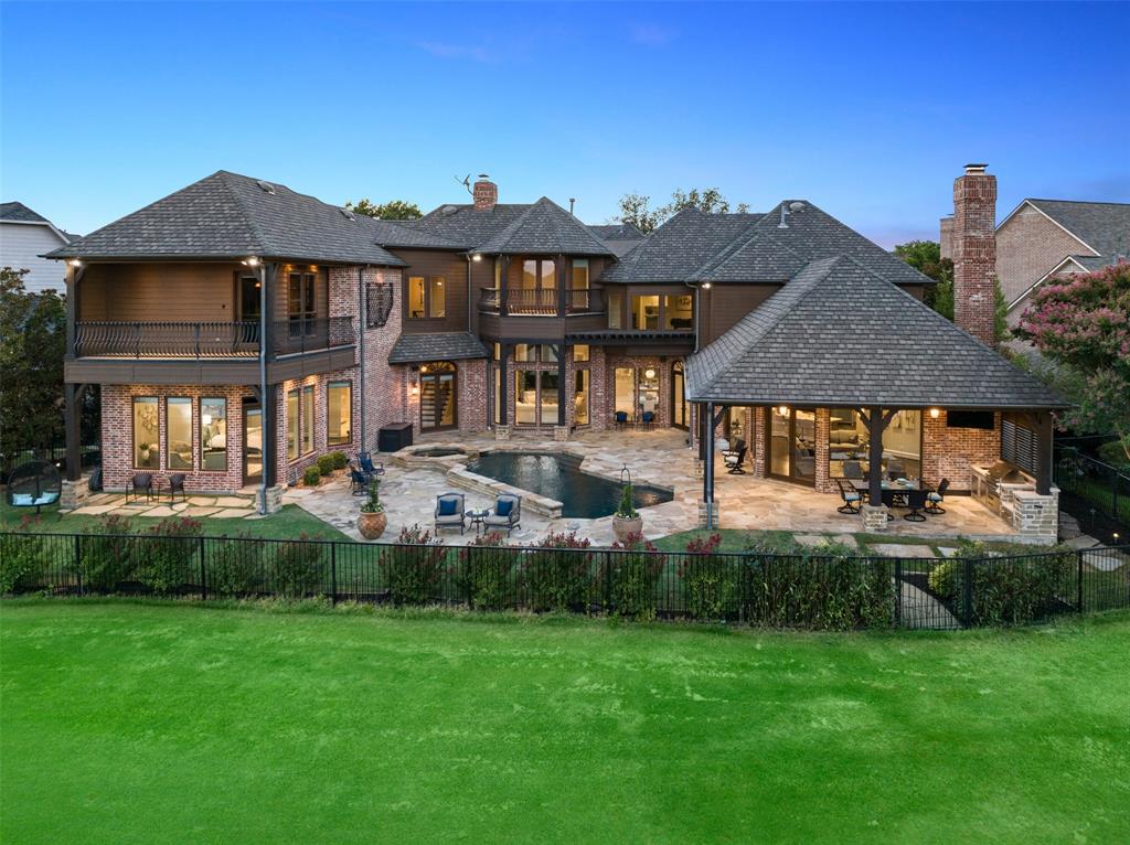 Rare opportunity to own this Stunning Home in Sought After Willow Bend Estates, located on the 16th Fairway of the Queen's Course at the prestigious Gleneagles Country Club. This is truly an Entertainer's Dream Home! Enjoy breathtaking panoramic golf course and water views from almost every room. Beautifully Updated with high-end designer finishes and modern touches, creating a comfortable, elegant home. Custom Iron doors, marble floors, rich molding, split staircase, gallery lighting, floor-to-ceiling windows, oversized bedrooms, and more. Enjoy a cup of coffee & watch the sunrise from your second-story balcony. Entertaining is a breeze with an open floor plan, chef-inspired kitchen, full bar, outdoor kitchen, & living area. Then, retreat to your primary oasis with a spa-like bathroom, double vanities, and soaking tub, truly an owner's dream. The resort-style backyard will make you forget about the summer heat with a refreshing pool and two covered patios.
