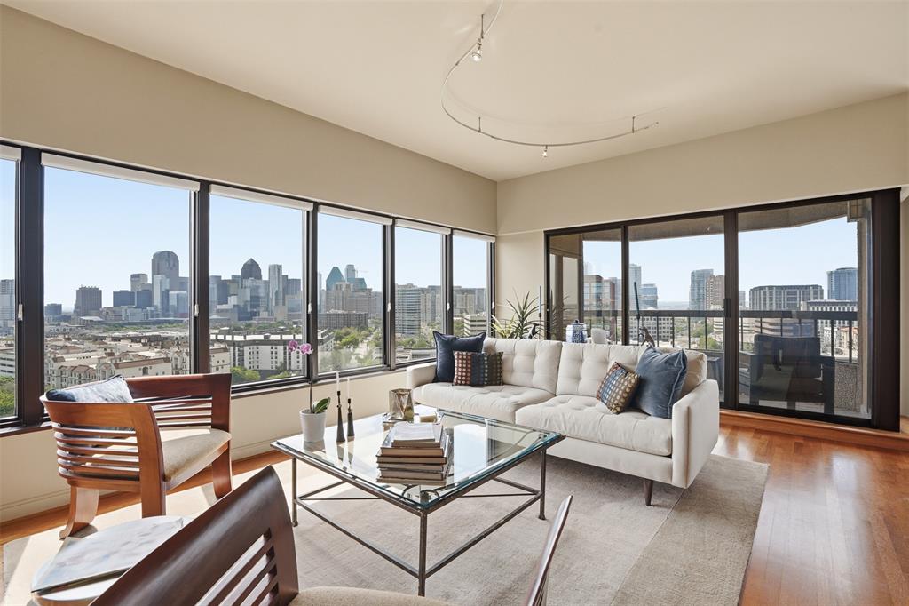 Elevated on the 16th floor of the iconic La Tour, this 3,126-square-foot double residence breaks the mold of standard high-rise living. By merging two units into one cohesive, L-shaped floor plan, designers Marco French and Ike Eisenhower created a space that feels more like a sprawling estate in the sky than a traditional condo. Perimeter walkways wrap around the home, ensuring that the 270+ degree views—stretching from the iconic Downtown skyline and Fair Park to North Dallas—are always the focal point.

The layout is intentionally split into two distinct wings to balance high-end entertaining with total privacy. Wing one is built for hosting, featuring an expansive living and dining area, full kitchen, guest suite, library, and a flexible executive office that easily converts into a third bedroom. On the other side, wing two is a dedicated retreat, anchored by a massive primary suite with a spa-inspired bathroom and dual ELFA closets. It also houses a refined media lounge equipped with a full bar, wine fridge, and ice machine—perfect for late-night movies or a quiet drink.  

The tech and perks here are just as impressive as the views. The home is outfitted with Grafik Eye lighting, a 12-speaker Sonos system, and Hunter Douglas shades. Rare for Uptown, the property includes four parking spaces, two storage units, and two board votes.

Living at La Tour means more than just a great view; it’s a full-service lifestyle. You’re steps away from the Katy Trail and the best dining in Uptown, but you also have a resort-style pool, a fully equipped gym with saunas, tennis and pickleball courts, and a private dog park right at home. With 24-hour concierge, valet, and a long-tenured staff handling everything from security to packages, the experience is entirely effortless. Whether you’re throwing a party against a backdrop of city lights or disappearing into your private wing, this is a level of space and security that’s hard to find anywhere else in the city.
