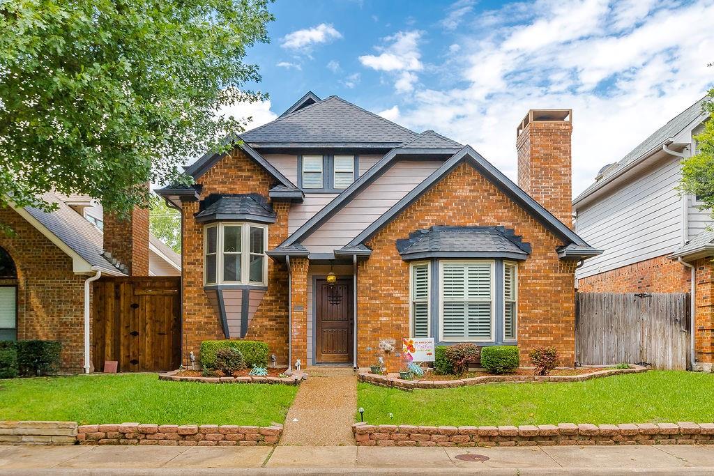 Rare opportunity to own a beautifully updated home in Bent Trail Village with a Dallas address and highly acclaimed Plano ISD schools. This charming 2-bedroom, 2-bath home features soaring ceilings with exposed beam detail, abundant natural light from skylights, extensive built-ins, and gorgeous wood floors throughout most of the home. The inviting family room is anchored by a decorative tile fireplace, creating the perfect space for relaxing or entertaining. The kitchen offers freshly painted white cabinetry, granite countertops, a breakfast bar, and double ovens, while the formal dining room includes a wet bar for effortless hosting. Both bathrooms have been completely updated with stylish finishes. The spacious primary suite features wood flooring and a stunning spa-inspired bathroom with a freestanding soaking tub, frameless glass shower with spa jets, marble vanities, linen storage, and a large walk-in closet. A converted garage creates an oversized flex space complete with a large walk-in closet, making it ideal for a game room, media room, home office, second living area, or potential future conversion back to garage space. Seller willing to convert garage back and if so total square footage will reduce 400.  Additional updates include new windows, shutters, and a new roof installed in 2023. Enjoy outdoor living on the private side patio with plenty of room for seating and grilling. Backing to Moss Glen Park and located in one of the area's most desirable neighborhoods, this move-in-ready home combines character, thoughtful updates, and an unbeatable location.