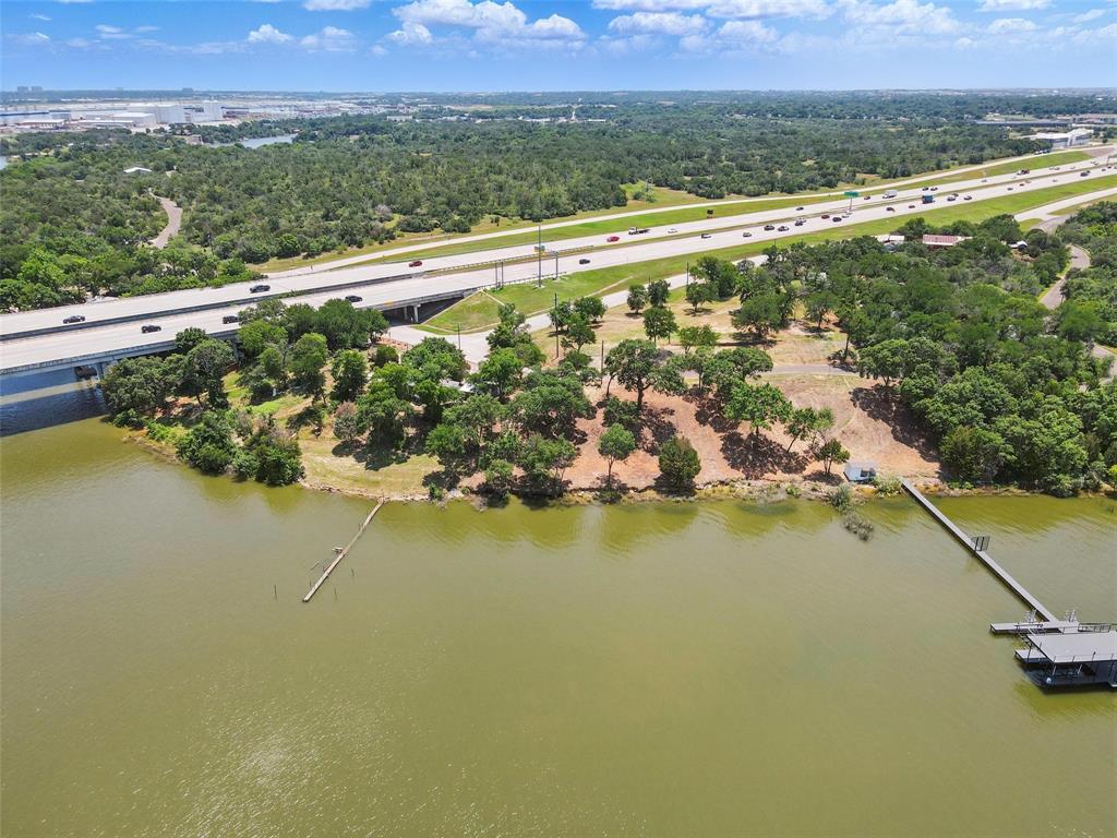 Looking for deeded waterfront property with space to build your dream home and private dock? This beautiful building lot sits on a gentle hill overlooking the open water of Lake Worth, offering sweeping views and endless potential.   With permanent easement lake access, you have the rare opportunity to build a custom dock to suit your lifestyle—whether it’s boating, jet skiing, fishing, or simply enjoying sunset views over the water. Imagine having your own personal spot to take in fireworks, the Joint Reserve Base Air Show, and even a glimpse of the downtown Fort Worth skyline.
  Enjoy lakeside living with easy access to highways, shopping, and just 15 minutes to downtown. Whether you're planning a weekend escape or a full-time residence, this property offers the perfect canvas. Come enjoy the view and create your own waterfront dream!