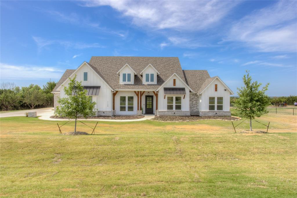 Experience the breathtaking sunrise and sunsets at this ranchette property in Stagecoach Ranch. Located just minutes away from downtown Weatherford, this property is nearly 4 acres with a wet weather creek running across it and scattered trees in the back acreage. Entertain on this Texas sized island while enjoying the sunset views from the kitchen or watching a fire in the beautiful ceiling length stone gas fireplace. Extra large chandeliers, designer lighting, and custom finishes throughout the house are breathtaking. The owner's suite boats a standalone tub, oversized glass shower, and giant master closet, with rods complete to the top. The neighborhood has only 43 homesites and all lots over 3 acres. Enjoy the community fishing pond and great HOA this neighborhood has to offer. This house is on well and septic, with no city taxes and includes a brand new water filtration system and softener.  See docs for floor plan. Buyer to verify all information.