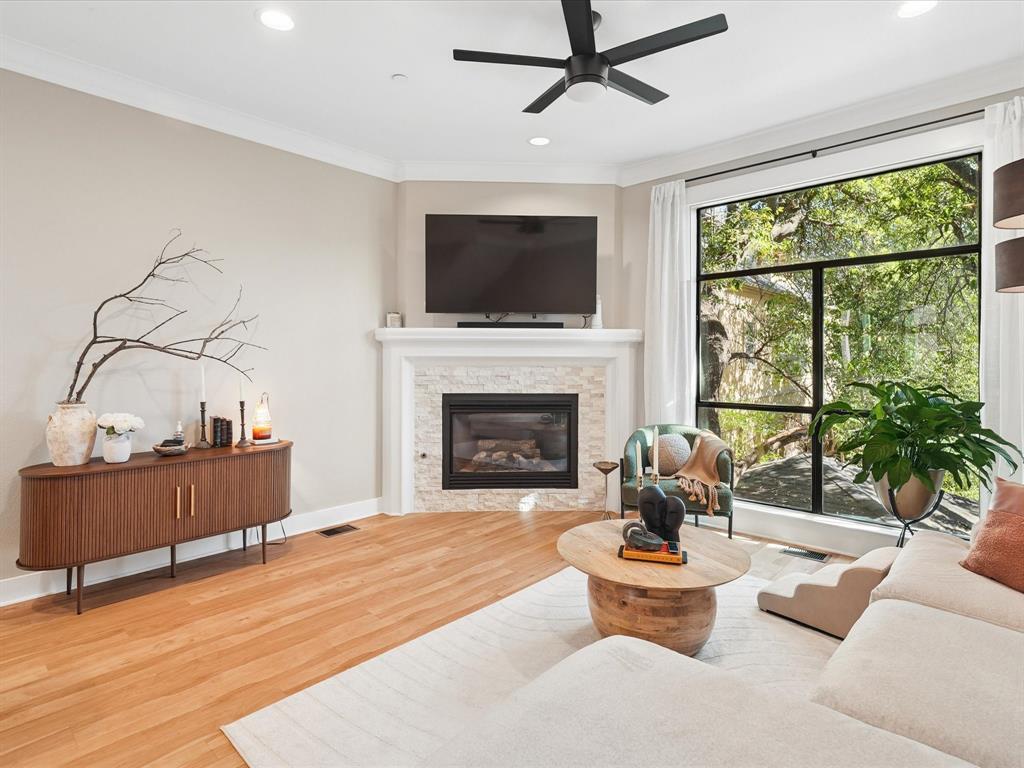 Welcome to this fully remodeled home in the highly desirable Oak Lawn area of Dallas with $80,000 worth of updates. Featuring an open-concept floor plan, the home has timeless, modern finishes throughout. Enjoy freshly painted walls, luxury vinyl plank flooring, a tankless water heater, and a beautifully updated bathroom complete with Italian marble-look tile and quartz countertops.

The kitchen has white cabinetry, quartz countertops, and stainless steel appliances, and it opens to a front balcony that fills the space with natural light. The spacious living room offers views of mature trees, a cozy fireplace, and flows seamlessly into a generously sized dining area.

Additional upgrades include recently updated ceiling fans, light fixtures, and door hardware. The stone and stucco exterior provides excellent curb appeal, while the gated, intimate community offers both privacy and security.

The fourth floor features a spacious loft that can be used as a third bedroom with its own closet and access to a rooftop deck, creating the perfect blend of indoor and outdoor living. Enjoy fresh air year-round, ideal for relaxing evenings or entertaining guests.

This home offers the perfect balance of comfort, style, and convenience in a prime location. You’re minutes away from restaurants, Whole Foods, bars, and easy access to everything Dallas has to offer. Craddock Park is 4 min walk from home. Smart home features include google nest throughout, wifi enabled garage door and google front door. 

Schedule your private tour today and experience the exceptional lifestyle at 3222 Wycliff Ave!