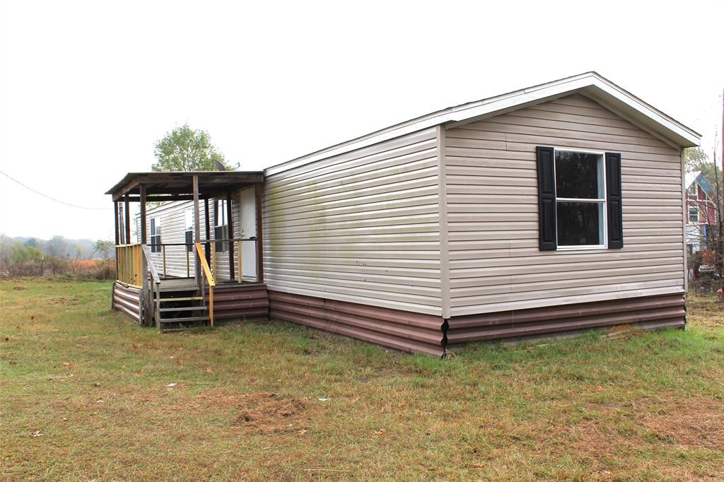 Charming country retreat near Cedar Creek Lake. Welcome to peaceful country living on approximately 0.43 acres in the Spring Valley Acres community, just minutes from Cedar Creek Lake. This 2019 single-wide manufactured home offers 3 bedrooms and 2 full bathrooms with approximately 1,216 sq ft of comfortable living space. Recent updates and improvements have been made to enhance the home’s appeal, including fresh interior paint, front porch repairs with new railing and support beams, and professionally clean carpets. Inside, you’ll find washer, dryer connections, ceiling, fans, and an electric water heater for every day convenience. The property features a large, partially fenced yard with scattered mature trees, providing plenty of space for outdoor activities, pets, or entertaining. A nice covered front porch offers a relaxing place to enjoy your morning coffee and the storage building as valuable functionality for hobbies or tools. Located close enough to Cedar Creek Lake for boating, fishing, and recreation, yet tucked away for privacy, this home is ideal as a primary residence, weekend get away, or investment opportunity. Come see the potential and make it your own!