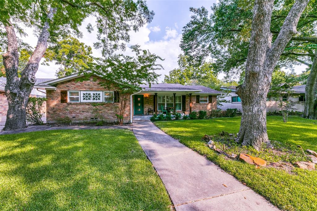 This tastefully renovated home showcases high-end finishes and an open-concept design. The chef's kitchen features a Thermador 48-inch gas range, quartz counters, and a wine fridge. Two master suites offer spa-like baths and custom closets. Updated plumbing, electrical and HVAC.
This upgraded home offers both elegance and convenience, situated near White Rock Lake, as well as many great shops and restaurants.