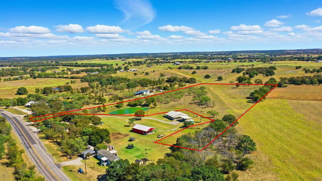 Discover 10 beautiful acres just outside Millsap, TX: fully fenced, AG-exempt land blending open pastures, mature trees, and a scenic pond. This versatile property is perfect for a dream home, livestock, or small-scale farming, with the tranquility of country living yet quick access to city amenities. Ideal for equestrian, agricultural, or investment purposes, it offers expansive space for building, grazing, and or crop growth. Proximity to schools, shops, and dining ensures convenience without sacrificing rural charm. Schedule a private tour and envision your life on this charming Parker County parcel.