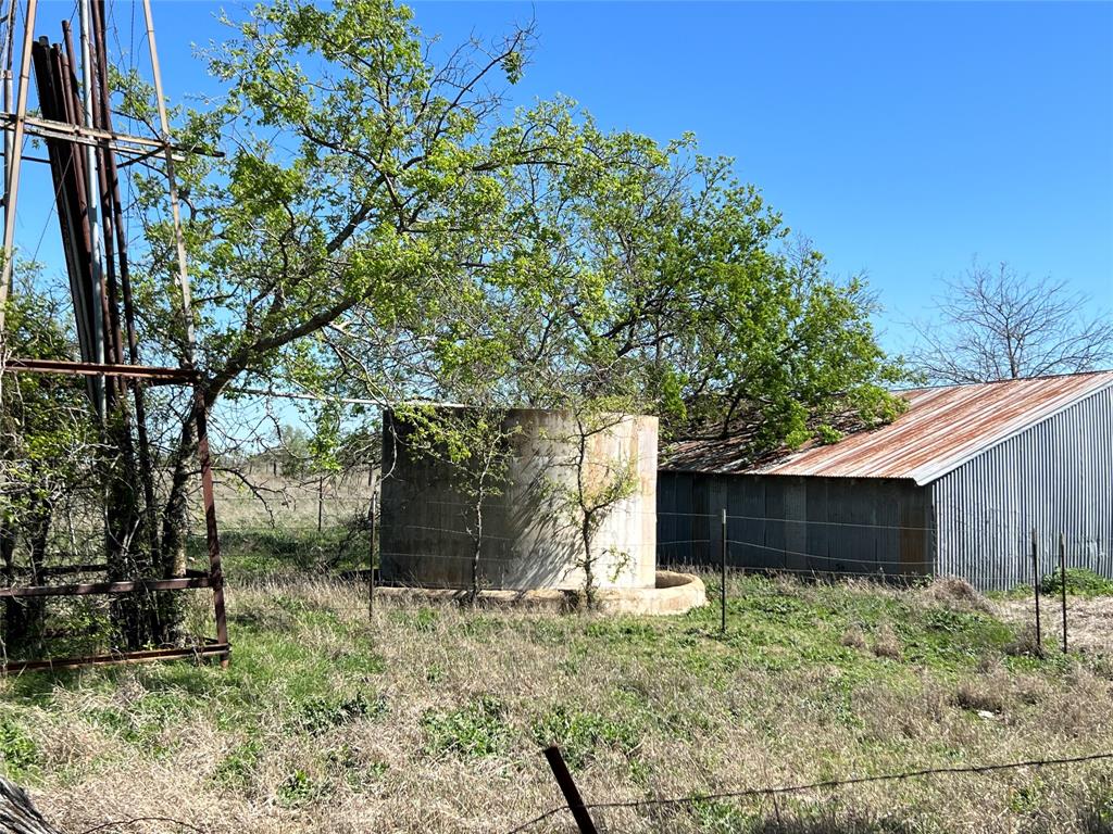 This 10.01 acre ranch has it all! A gated entrance opens to the private road that leads to this gorgeous tract. The terrain change and long-range views are phenomenal. There are good building sites along the ridge and at the front and back of the property. This tract includes an old goat barn with remnants of an old windmill and storage tank.The property has some old crossfencing and a pasture road leads up to the goat barn and back of the property. Loaded with hardwood trees and browse; wildlife include deer, wild hogs, turkey and varmints.The property is ag exempt. Located 25 minutes from both Hamilton and Comanche, TX. This property is an easy 2 hour drive to the DFW metroplex and Austin. High Speed 1GB Fiber Internet and Electricity is available on the private road; a well and septic will need to be installed. There are light deed restrictions.All acreages and boundary lines shown on media are approximate. Any information provided herein is subject to changes, errors and omissions.