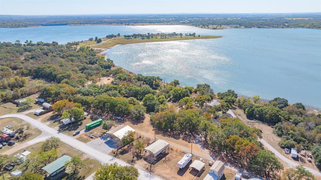 Discover your perfect getaway spot at Lake Proctor! These two adjoining lots in the peaceful Promontory RV Resort community are ready for your weekends, vacations, or full-time lake living. 

Enjoy the convenience of a new 500-gallon holding tank with alarms, along with on-site power and water connections already in place. The property includes a storage building complete with laundry hook ups. Everything is set up for an easy transition so you can start enjoying lake life right away.

Whether you’re looking for a quiet retreat, an affordable lake property, or a place to build in the future, this setup offers both comfort and flexibility just minutes from Proctor Lake.

Ready for your next adventure—or your next chapter—at the lake? Call me to schedule your private showing today!