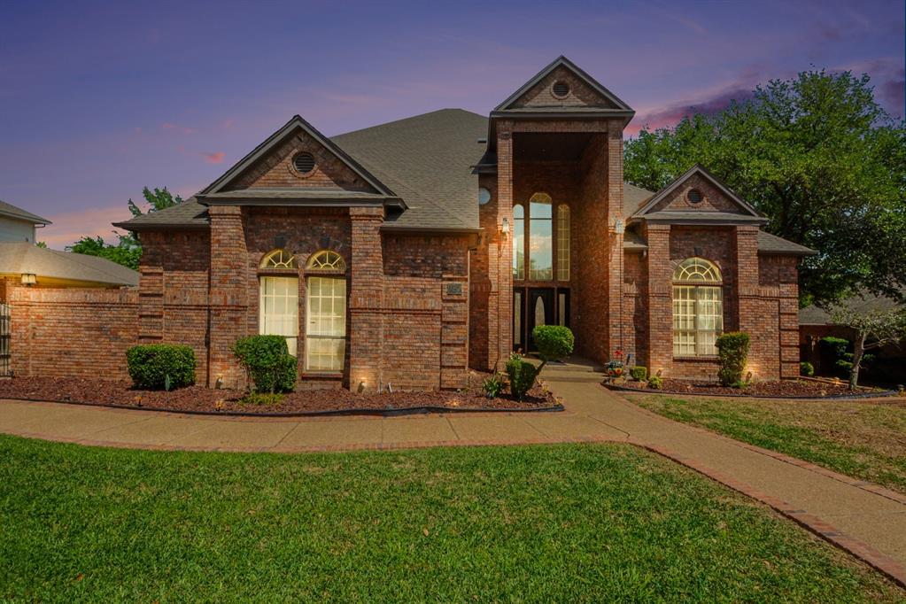 Welcome to the desirable Georgetown community, offering a private pond, walking trail, and playground. This beautifully designed home features an open floor plan that seamlessly blends the living, dining, and kitchen areas, highlighted by soaring 24-foot ceilings, multiple living spaces, and two inviting fireplaces. The chef’s kitchen boasts granite countertops, a spacious center island, stainless steel appliances, and abundant cabinetry. The primary suite is a true retreat with a cozy sitting area, large windows, dual vanities, a jetted tub, and an impressive walk-in closet complete with built-ins and a separate cedar closet. Timeless details throughout the home include wood beams, crown molding, tray ceilings, and recessed lighting.
Step outside to your private backyard oasis with a sparkling pool and covered patio, ideal for both relaxation and entertaining. A wide driveway and three-car garage provide ample parking, including space for an RV. Conveniently located near shopping, dining, entertainment, and with easy freeway access.