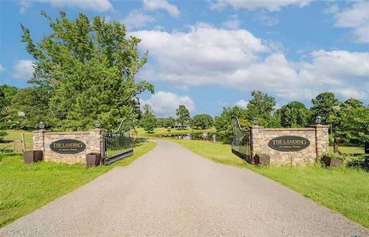 13 beautiful acres carved out this 100 acre tract in the scenic East Texas piney woods, The Landing Event Center offers a rare opportunity to purchase both expansive land and a thriving event venue. The 8,228 sq. ft. commercial building is centrally located between Longview, Kilgore, and Henderson, just minutes from Gregg County Airport and less than a mile from Lake Cherokee. Built in 2015, this fully furnished, turnkey property blends refined style with classic Texas character. The venue is well suited for weddings, celebrations, corporate functions, Quinceañeras, and outdoor events, with flexible indoor and outdoor spaces that accommodate gatherings of all sizes. Interior highlights include a 1,400sq. ft. banquet hall, a 2,100 sq. ft. event space with stage, and an inviting foyer featuring a fireplace and bar. Additional amenities include bride and groom suites, a commercial kitchen, generous storage, and room to expand. Surrounded by open pasture and wooded acreage, the property can host up to 250 guests indoors and more than 500 when utilizing outdoor areas. A unique on-site helicopter landing capability adds convenience for special or high-profile events. Located just five miles from the I-20 corridor and future development plans, this property is ideal for investors, partnerships, churches, or event operators. Don't miss your chance to own one ofEast Texas's most well known event and wedding venues!
