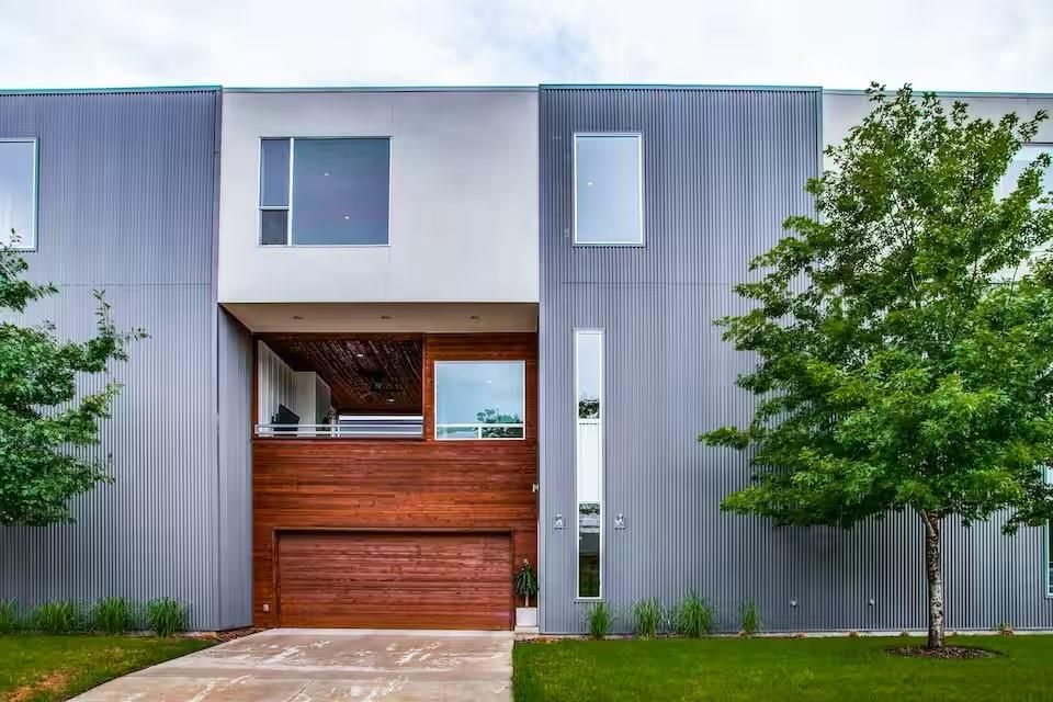 Thoughtfully designed and beautifully finished, this 2,347-square-foot condominium in East Dallas offers a refined take on modern urban living.The chef-inspired kitchen features striking quartz countertops, stainless steel appliances, and generous storage—perfect for hosting or everyday living. An open-concept layout flows seamlessly into the dining and living areas, where soaring ceilings amplify the space and natural light pours in.

Step outside to a private second-floor terrace, your own hidden retreat complete with a fireplace—ideal for cozy nights, entertaining, or relaxed al fresco dinners. Two spacious bedrooms and two-and-a-half baths offer both comfort and style, while the light-filled primary suite impresses with a large walk-in closet, a dedicated study, and serene treetop views.

Expansive windows flood the home with sunlight, highlighting polished concrete and hardwood floors throughout. Tucked among lush greenery yet just minutes from everything Dallas has to offer, this home is the perfect blend of modern design, privacy, and city convenience. Investors DREAM Airbnb - currently serves as one! With World Cup coming to Dallas this could be an amazing opportunity.