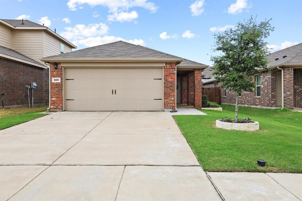 Welcome to 808 Corral in the highly sought after Magnolia community! This inviting neighborhood delivers an unmatched lifestyle with top tier amenities right in your backyard. Residents enjoy exclusive access to the community pool, a beautiful catch and release lake, private walking trails, and family friendly playgrounds. This open concept 3 bedroom, 2 bathroom layout and price point is a great find in today's market within this neighborhood. Offering the perfect balance of privacy and functional design, it is the ideal setup for anyone ready to transition from renting to owning. Experience the freedom of having your own space, hosting friends, and investing in your own future. Easy flow between living, kitchen and dining, everyone can be part of the conversation.  At the center of the home lies an attractive kitchen featuring a fantastic island with breakfast bar, generous counter space, and an amazing pantry. The kitchen creates the ideal layout and gathering space to cook, connect, and enjoy with your favorites. The main bedroom is spacious with a big closet. The ensuite's vanity, built-ins and shower are great features. Two additional bedrooms, plus a full bath offer flexibility.  Cozy covered patio and easy maintenance backyard create a relaxing space to dine, read a book, play, with potential gardening space. Located within Community ISD, Roderick Elementary is within the community.  This exceptional property blends everyday convenience with true community charm. Enjoy the ease of nearby shopping and restaurants, complemented by the fantastic new Josephine community center. With the ongoing City Center development promising even more dining and retail options, this growing area offers fantastic long term value. Warm, welcoming, and perfectly positioned, this property is incredibly easy to come home to.