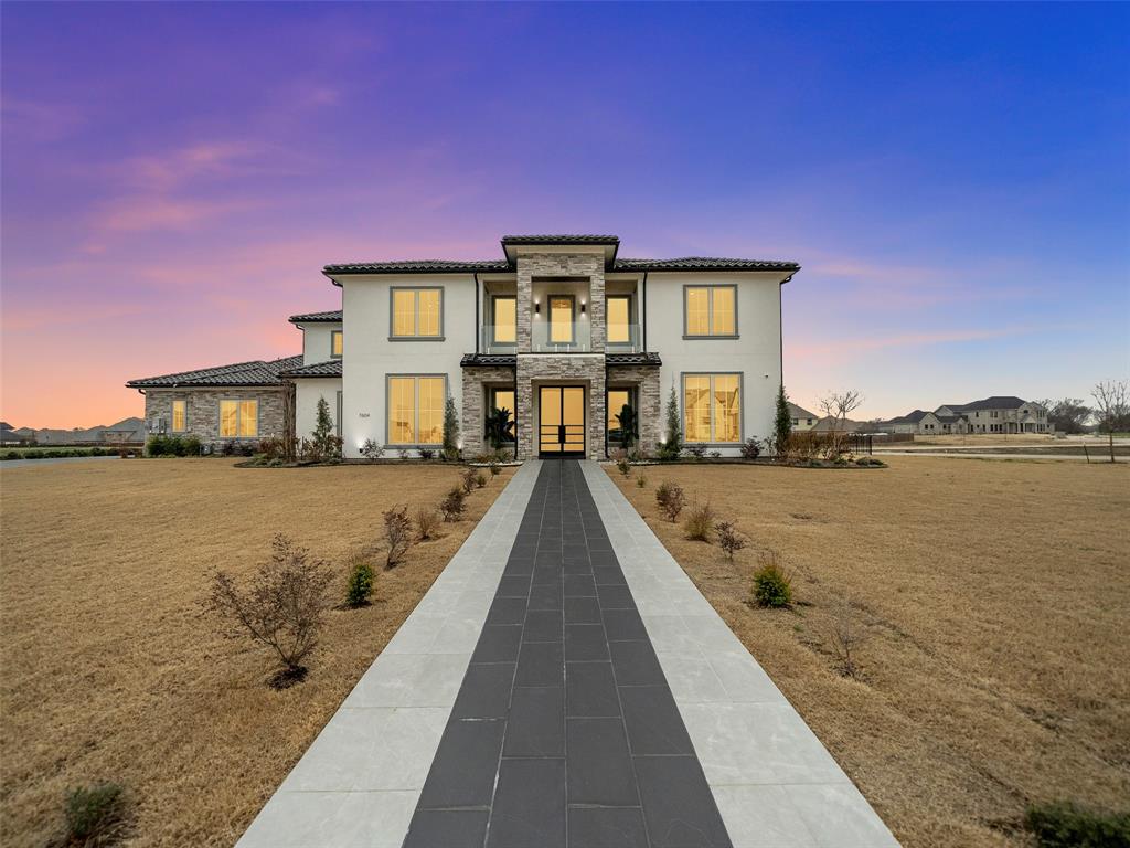 This stunning Parker property boasts a spacious and thoughtfully designed layout, perfect for discerning buyers seeking luxury and comfort. It features five generously sized bedrooms, each with its own bathroom, ensuring both privacy and convenience. The heart of the home is an open-concept living area that seamlessly transitions to outdoor dining and living spaces, making it ideal for hosting gatherings or simply relaxing in the Texas sunshine. A beautiful Imported Custom tile foyer leads to oversized living and dining rooms, while the kitchen, equipped with a center island and butler's pantry, opens to a cozy breakfast room. The den, adorned with French doors, overlooks the backyard, enhancing the connection to nature. The luxurious primary suite includes a custom closet and a private balcony with views of the yard, complemented by a second master suite and three additional spacious bedrooms along with a playroom on the second floor. The backyard is an entertainer's dream, featuring an outdoor kitchen and covered patio, while practical amenities include an attached four-car garage, an elevator, a Dirty kitchen, and three outdoor balconies. Situated on a 1.4-acre lot, this  custom-built home offers an impressive 7,436 square feet of living space, making it a remarkable find for anyone looking for elegance and comfort.
