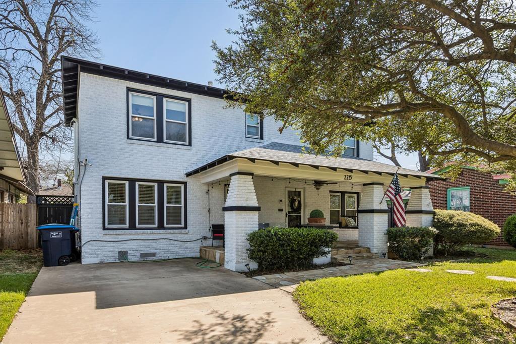 Experience the soul of Fort Worth in this meticulously curated Mistletoe Heights bungalow, where 1930s elegance meets high-end, turnkey luxury. From the moment you pull up to the leafy, tree-lined street and spot the signature Mistletoe tree in the front yard, you’ll feel the history of one of the city’s most coveted historic districts. Stepping onto the expansive, covered front porch, you are welcomed home by a stunning stained-glass-accented front door. Inside, the narrative of the home unfolds through rich wood flooring, wide architectural moldings, and charming glass doorknobs. Every corner whispers of the past, from the textured wallpaper ceilings to the sunlight filtering through original stained-glass windows, yet the lifestyle is entirely modern. The home has been thoughtfully remodeled, featuring a designer-curated interior, brand-new HVAC, energy-efficient windows, and a comprehensive Ring security system. The chef’s kitchen serves as the centerpiece for entertaining, boasting a Viking 6-burner gas range, generous cabinetry, and a built-in buffet server that seamlessly flows into the living spaces. Beyond the interior lies your own private backyard oasis. Imagine summer afternoons by the gorgeous pool, surrounded by lush, brand-new turf and a fresh pump system, designed for low-maintenance hosting and weekend cookouts. Located on the bluffs overlooking the Clear Fork of the Trinity River, the location is unbeatable. You are just three blocks from the Trinity Trails, a mile from the vibrant dining scene on Magnolia Avenue, and a short 10-minute drive to TCU or the Hospital District. Whether you’re heading to a concert at Dickies Arena, exploring the world-class museums of the Cultural District, or commuting downtown, everything is minutes away. This isn't just a house; it’s an invitation to live in the heart of where the West begins.