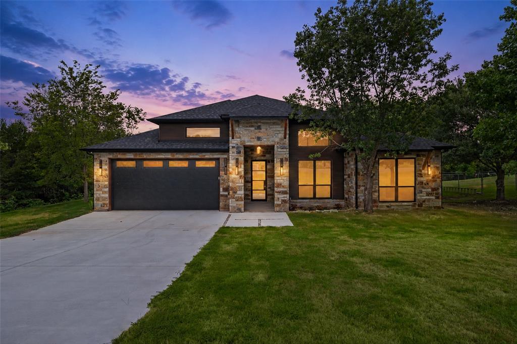 New construction with NO HOA! This beautiful Oklahoma stone home by local builder JMB Homes offers 4 bedrooms, 2 bathrooms, and sits on a large lot with mature trees. Step inside to soaring 15-foot ceilings, hardwood floors, and an open, light-filled layout. The kitchen is designed for both style and function, featuring custom soft-close cabinetry, high-end appliances, stone countertops, a large island, and an oversized walk-in pantry.
The spacious primary suite is a true retreat with a stunning ensuite bath featuring a large walk-in shower with three shower heads, gorgeous stone finishes, double vanities with anti-fog smart mirrors, and a huge walk-in closet.
Additional highlights include two secondary bedrooms with large closets and a fourth bedroom with impressive 15-foot ceilings, a spacious laundry room with plenty of storage, and a garage with wainscoting and finished epoxy flooring. Second bath also features gorgeous stone and high end touches like anti-fog mirrors. 
Energy efficiency is a priority with spray foam insulation in the attic and exterior walls, plus decked attic space for extra storage.
Enjoy entertaining on the covered back patio, overlooking a backyard with several mature trees. The home also includes gutters around the entire house, beautiful exterior lighting, a French drain, retaining wall, aerobic septic system, and newly laid sod.
Builder is willing to assist with a fence or closing help with an acceptable offer.
All information deemed reliable but not guaranteed, Buyer to verify all information.