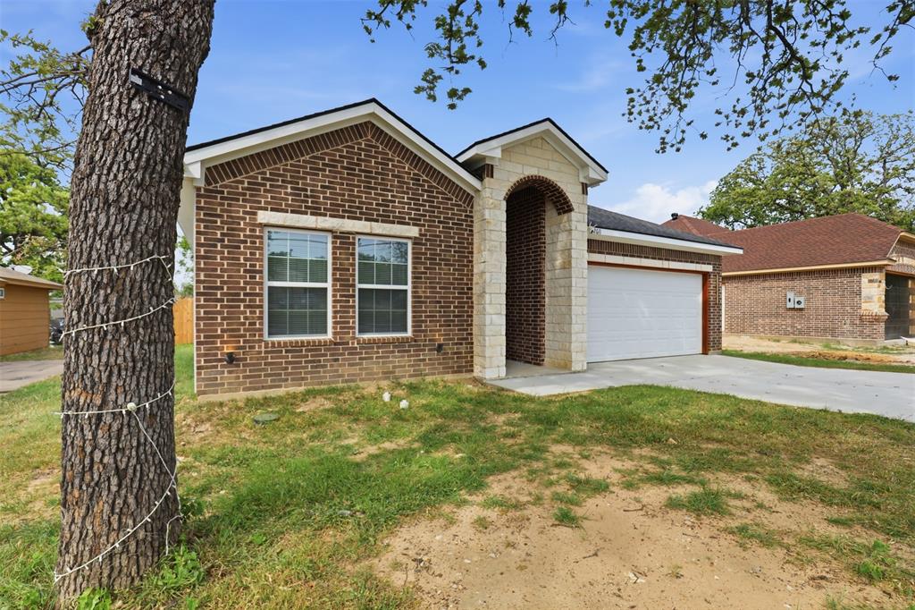 Move-in ready new construction. This 4 bed, 2 bath home offers a modern open layout with high ceilings and clean finishes throughout. Spacious kitchen with large island, custom cabinetry, and quartz countertops consistent throughout the kitchen and bathrooms, perfect for entertaining. Private primary suite with tiled shower. Beautiful flooring throughout for a clean, cohesive look. Includes large laundry room and 2-car garage. Conveniently located minutes from highways and downtown