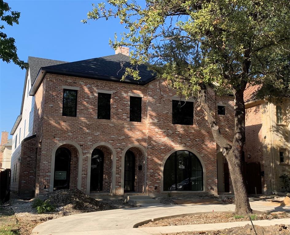 Look forward to being the first owner of this chic single-family attached home by well-known builder J Gregory Homes.  Enjoy entertaining in your spacious living room with brick fireplace, built-in cabinetry, and wet bar, open to the dining area and kitchen, with glass doors out to the turfed side yard.  The efficient island kitchen features a breakfast bar, gas range with double ovens, 42-inch refrigerator and walk-in pantry.  A private library makes an ideal home office.  Retreat upstairs to your primary bedroom suite and luxurious bath with dual vanities, freestanding tub, separate double shower, plus abundant closet space with built-ins.  Three additional bedrooms and a full-size laundry room complete the second level.  The third level offers a multi-purpose living area with wet bar.  Enjoy a low-maintenance lifestyle with all-new amenities in a prime University Park location, walkable to Highland Park Middle School, SMU, shopping and dining.