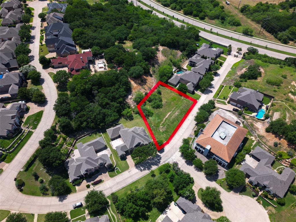 RARE OPPORTUNITY TO BUILD A CUSTOM HOME in one of Arlington's most exclusive and sought after gated communities, known for its upscale homes and strong property values. This generously sized .61-acre parcel offers excellent development potential for a custom luxury home. With relatively flat topography, the site is ideal for efficient construction and a fast turnaround. Located within minutes of the Arlington Entertainment District, enjoy easy access to world-class attractions, including Texas Live, Globe Life Field, and AT&T Stadium, this lot combines high-end appeal with convenience – a perfect formula for attracting premium buyers or maintaining strong property value. This is an ideal lot for a builder-developer looking to capitalize on Arlington’s growth and demand for custom homes in exclusive neighborhoods or a high end buyer looking to build their dream home in a well established neighborhood. Schedule your tour today! All information is deemed reliable but not guaranteed. Buyer and Buyer's agent to verify all information.