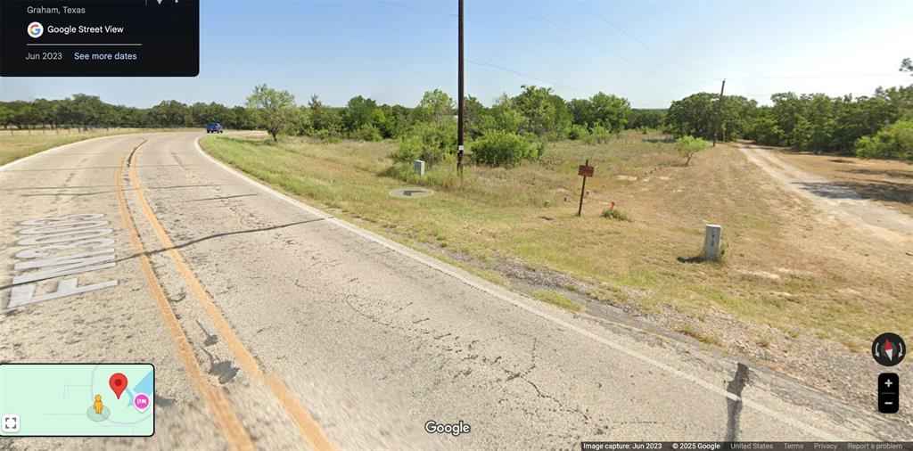 Lot #179 FM 3003 - Over one acre of waterfront land at Lake Graham now priced below tax appraisal value! Call your builder and bring your lake home dreams to life, or use it as is and enjoy the natural terrain as you hike down to the shoreline.  Covered with nice trees and unique rock outcroppings, with a fairly level top portion for ease of building; tiers down to the point of a cove with quick access to the main lake. This property is leased from the City of Graham, with a 40 year lease in place that is scheduled to renew in 2048...plenty of time to develop it and start making lake memories!
