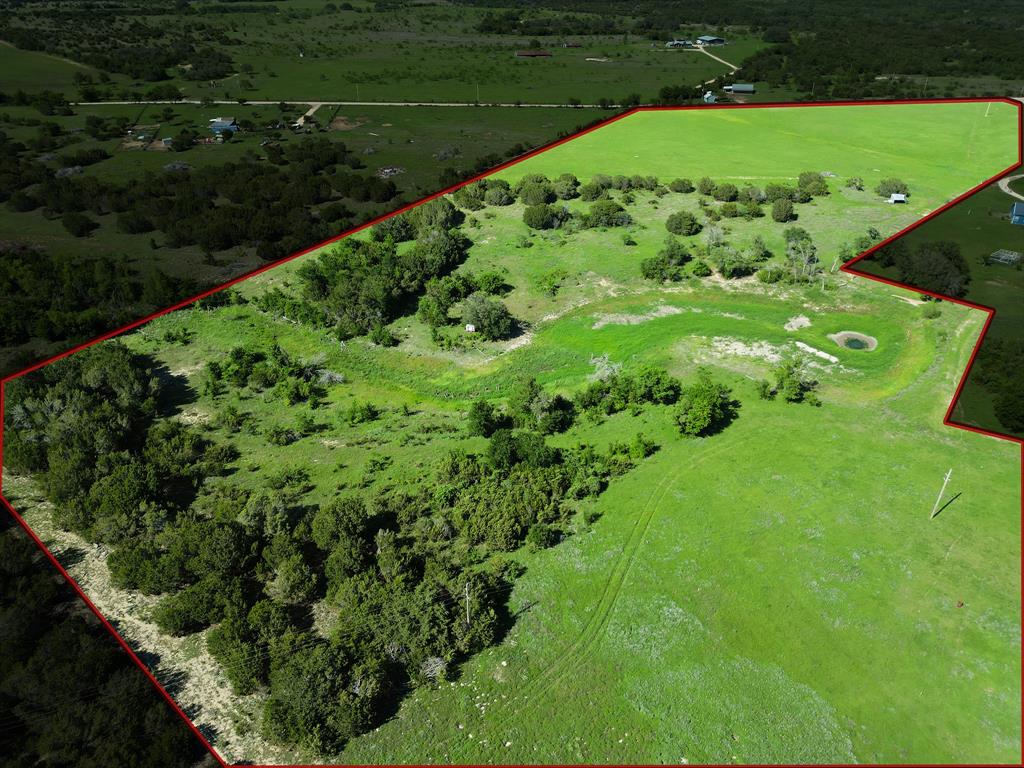 Welcome to over 24 acres of open land just outside the city. Bring your dream of building your home and expanding your farm. Fully fenced, this property offers space, privacy, and freedom with no restrictions. Picture a home set back from the road, morning views across open pasture, and evenings enjoying the sunset. Room for a custom home, shop, animals, livestock and outdoor living. A rare opportunity to own usable acreage with endless potential and a setting built for long term enjoyment. A short 20 minute drive to Stephenville and TSU. Only an hour and 20 minutes to Fort Worth.