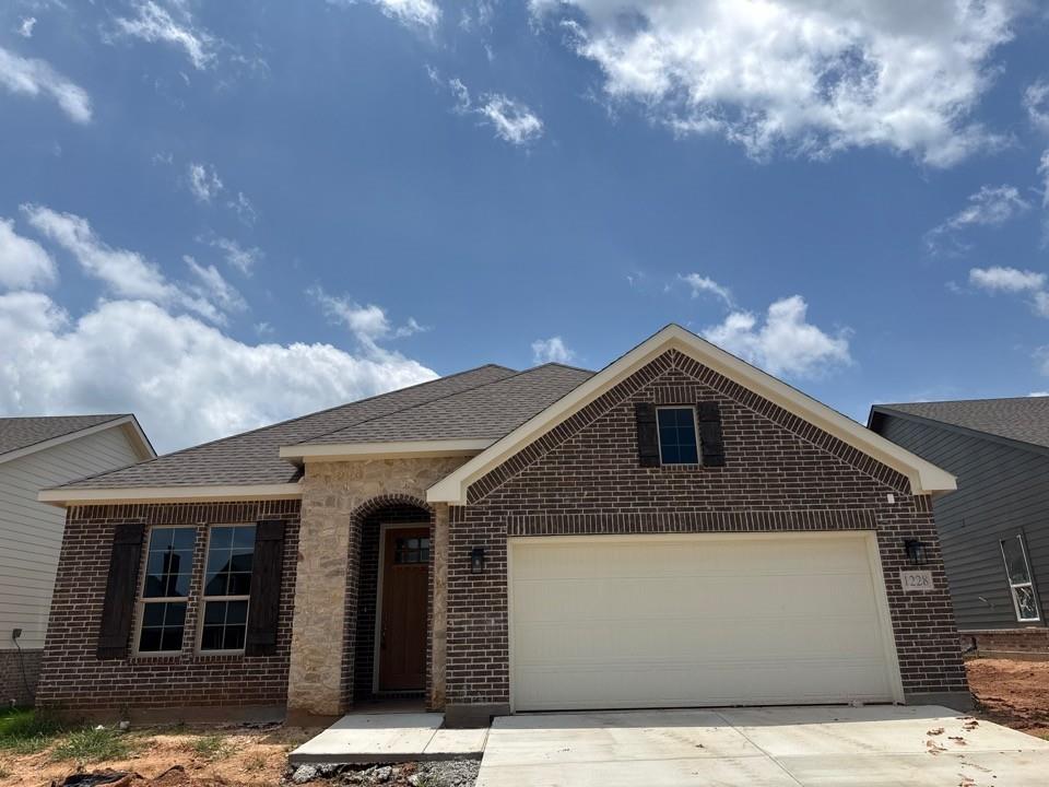 Estimated June 2026 completion! Ask us about our Trade In Trade Up program - we can buy your home! At Riverside Homebuilders, we pride ourselves in providing unique homes with floor plans that are as individual as our customers. This 3-bedroom, 2-bathroom home has a galley feel with an open floor plan. Walking into the grand foyer you’ll find yourself right at the entrance of the kitchen being welcomed by scents of freshly-baked cookies or a mouthwatering meal being prepared. The flex room in the front of the home can be easily utilized as another bedroom if needed or a den for reading and relaxing. Through the kitchen, you’ll find the cabinets open to the dining and living rooms at the heart of the home. A corner pantry gives you plenty of storage for snacks, canned goods, small appliances, and planning for a rainy day. To the right of the dining room lies the 2-bedroom wing. Whether for kids or guests, these rooms offer plenty of space with the convenience of their own full bathroom. Or, if you’re a new family preparing for your first little one, the secondary bedroom is close enough to the owner’s bedroom to feel safe having your baby sleep in their crib. The owner’s suite is nicely situated in the back corner with its own hallway to create the feel of your own private getaway. Enter the L-shaped bathroom through magnificent double doors. This floor plan offers one of our largest walk-in closets; we’ve maximized the space to offer enough room to change into that perfect outfit. Never track mud into your home again because the San Gabriel II has the laundry room situated off the garage. The unique layout of this home gives you the chance to do something different than all your friends while still providing a comfortable space to live and entertain.