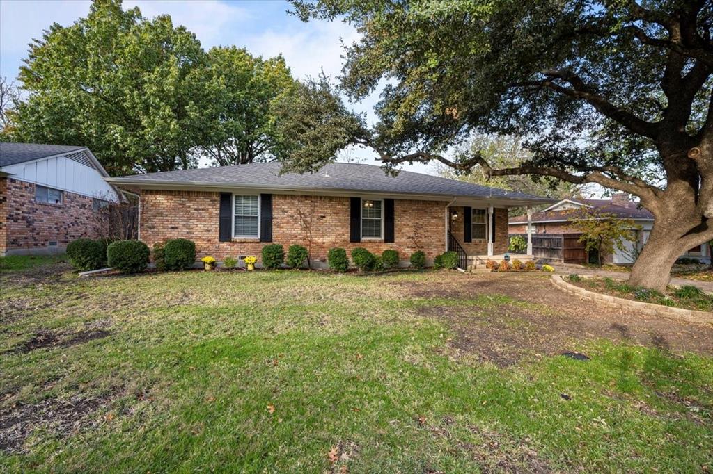 MULTIPLE OFFERS HIGHEST & BEST DUE BY 12-7-23 AT 5:00 PM. Beautiful Home in unique neighborhood with large lots and just one minute from downtown area. Large mature trees welcome you home. Extended curved driveway allows for extra parking for guests or boat. Enter to laminate flooring throughout the living areas and bedrooms. No Carpet! Kitchen boasts original wood cabinets for storage, white porcelain sink and stainless steel appliances. Dining room is directly across from kitchen for easy serving of meals. Large living room with brick gas fireplace as focal point. Perfect for a cozy evening at home on cold nights. Primary bedroom has walk in closet and en-suite bath with double vanities, soaker tub and large separate shower with beautiful decorative surround. Huge covered back patio perfect for bar-b-q's with the family. Seed has been laid in backyard for new grass in Spring. Shed or workshop in backyard with electric and HVAC would make the perfect she-shed or man-cave.