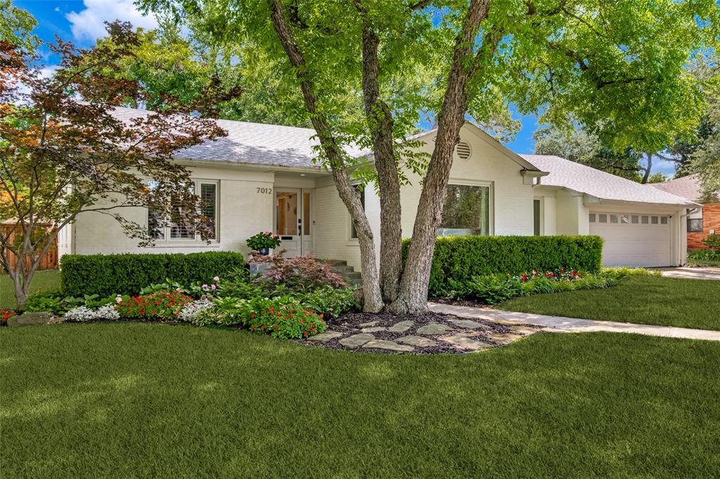 Set on a spacious one-third acre in the heart of Lakewood, this beautifully updated home blends timeless charm with light-filled, open living. Original hardwood floors, custom cabinetry, plantation shutters, and dual-pane windows create a warm yet airy atmosphere throughout. The kitchen is designed for both everyday living and entertaining, featuring quarts countertops, a five-burner gas cooktop, double ovens, and a full side-by-side refrigerator and freezer. Recently added guest quarters and an additional living area provide flexible space for hosting or relaxing. Step outside to a generous backyard retreat, complete with a gas fire pit, built-in indoor and outdoor audio, and an outdoor TV—perfect for gathering under the open sky. Meticulously maintained and thoughtfully improved, this home reflects over 30 years of pride and care, offering a rare opportunity in one of Lakewood’s most desirable locations.